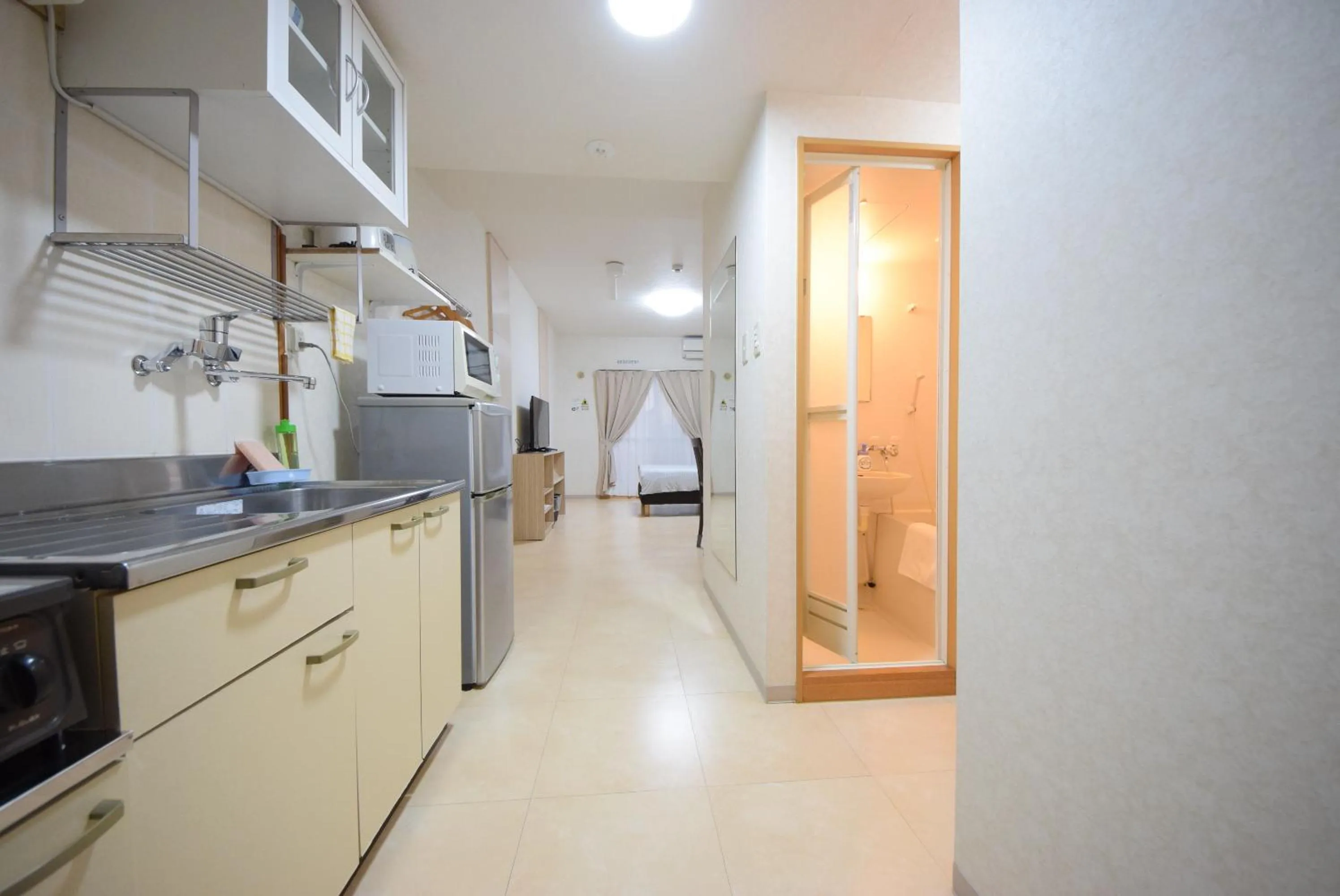 Photo of the whole room, Kitchen/Kitchenette in STAY IN SUMUKA Kokusai Street