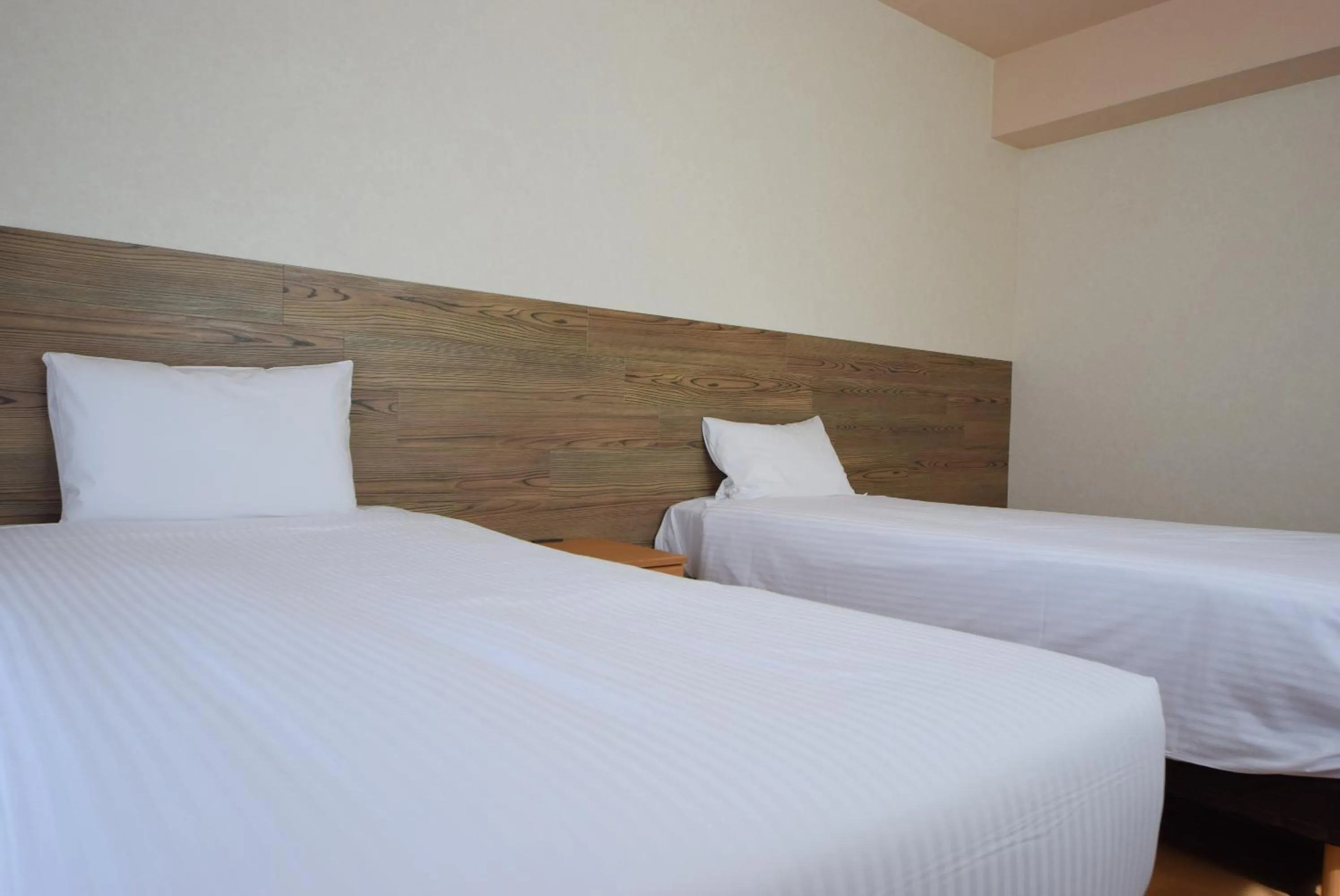 Bed in STAY IN SUMUKA Kokusai Street