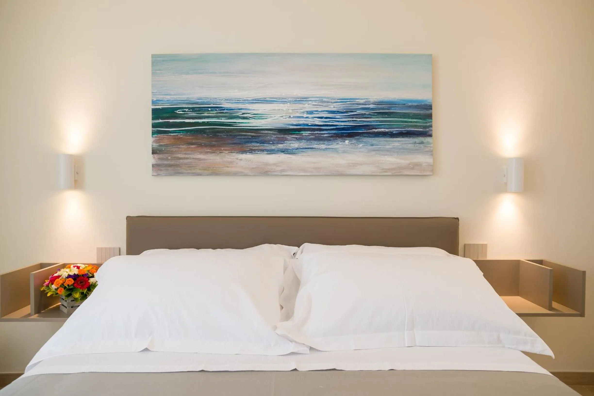 Bed in kamilia guestrooms