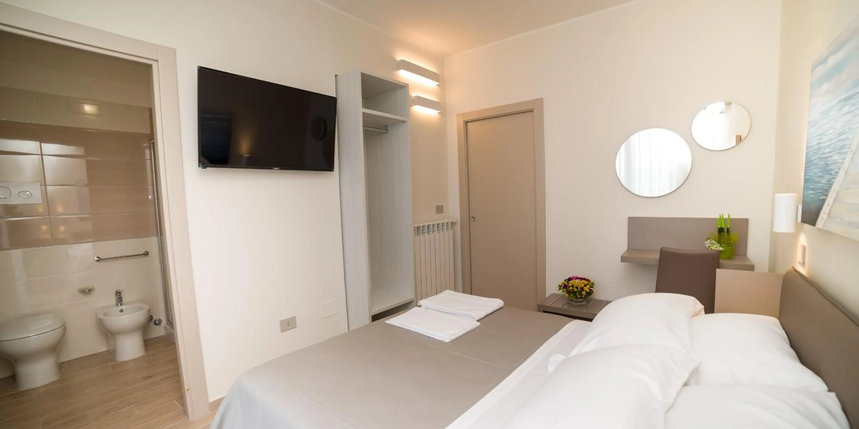 Bed in kamilia guestrooms