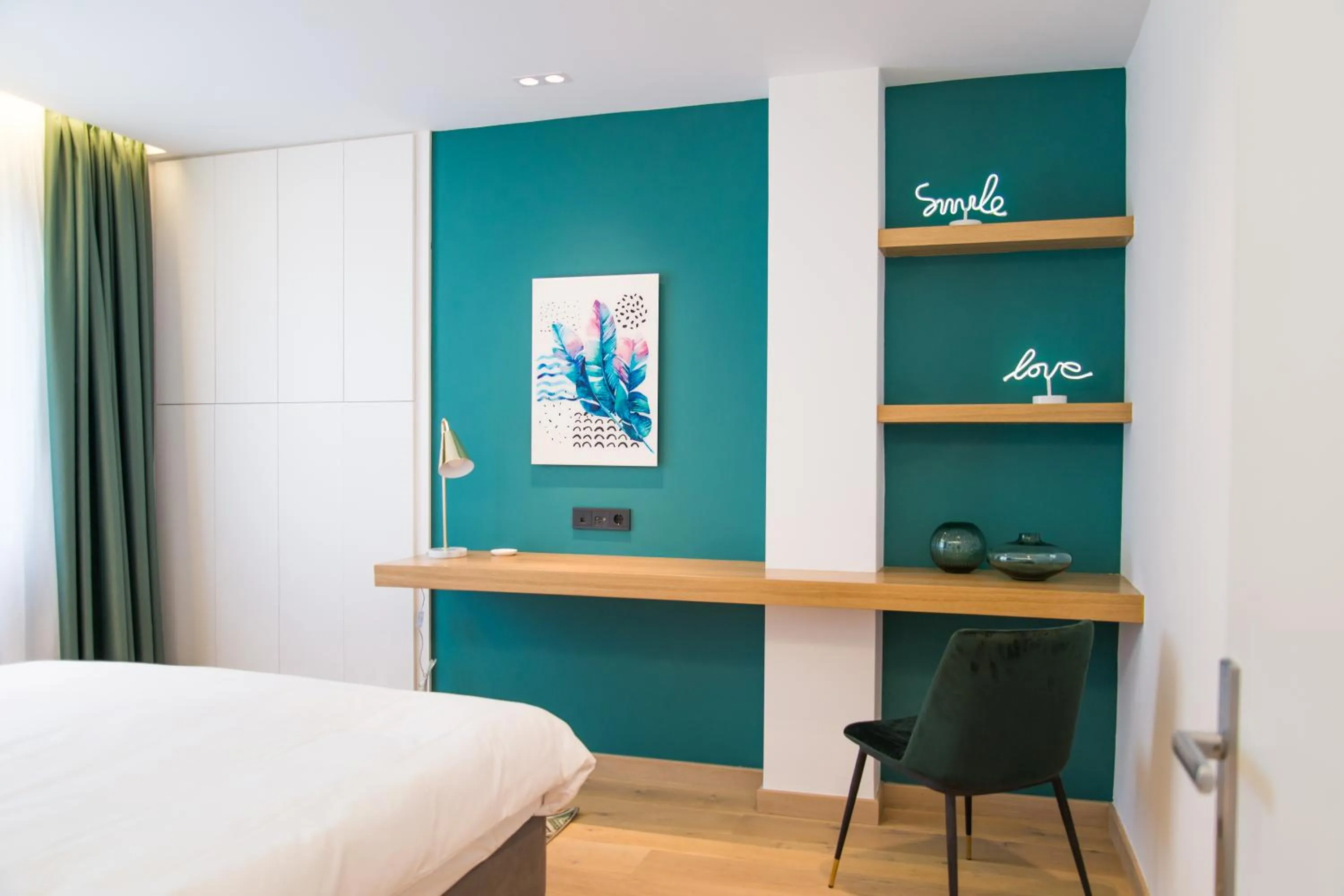 Bed in PINACOTA SUITES ATHENS