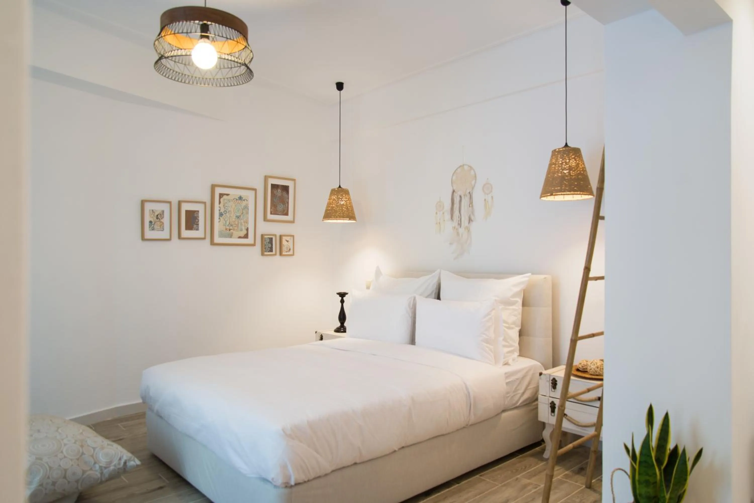 Bed in PINACOTA SUITES ATHENS