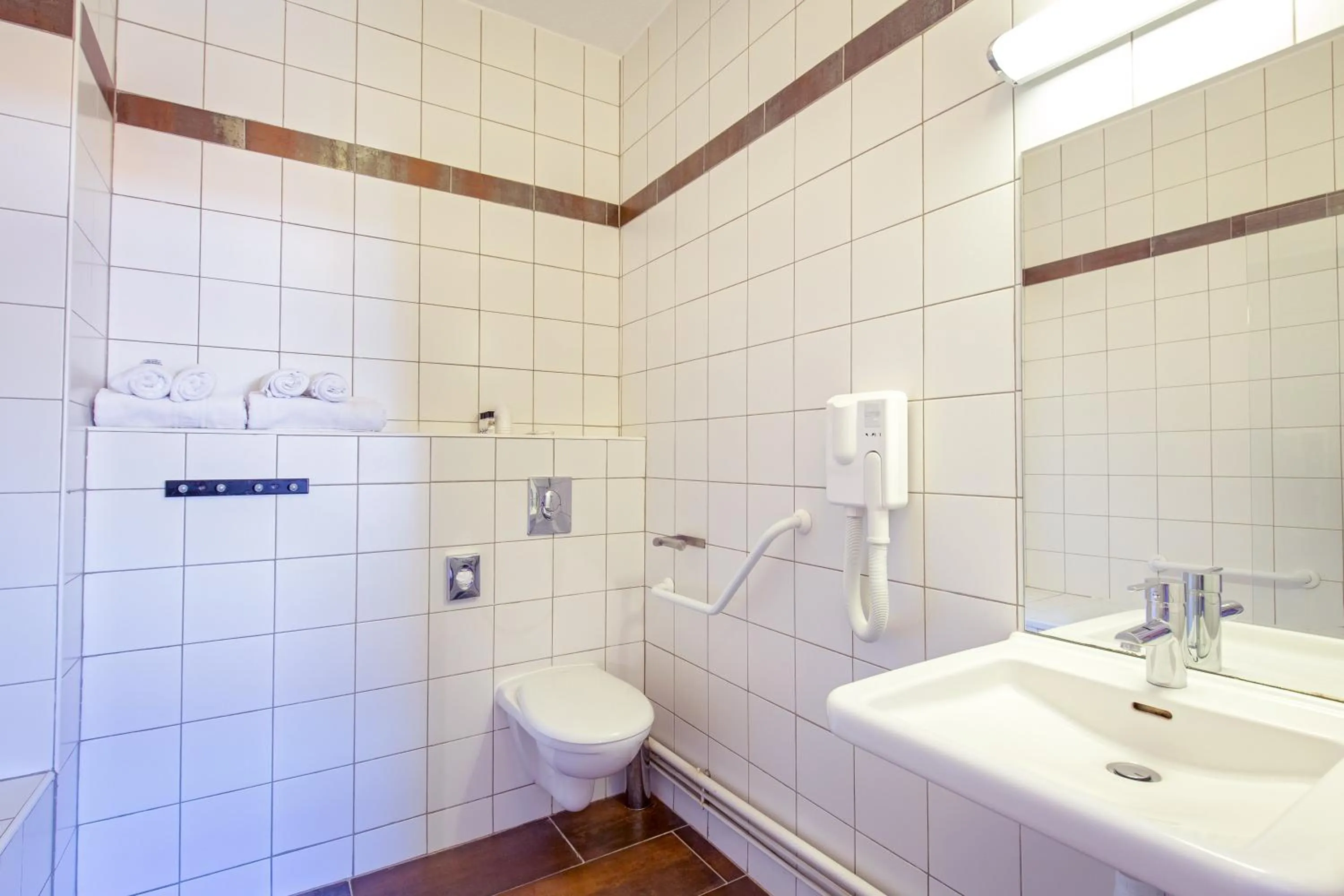 Bathroom in SOWELL HOTELS Le Pas du Loup