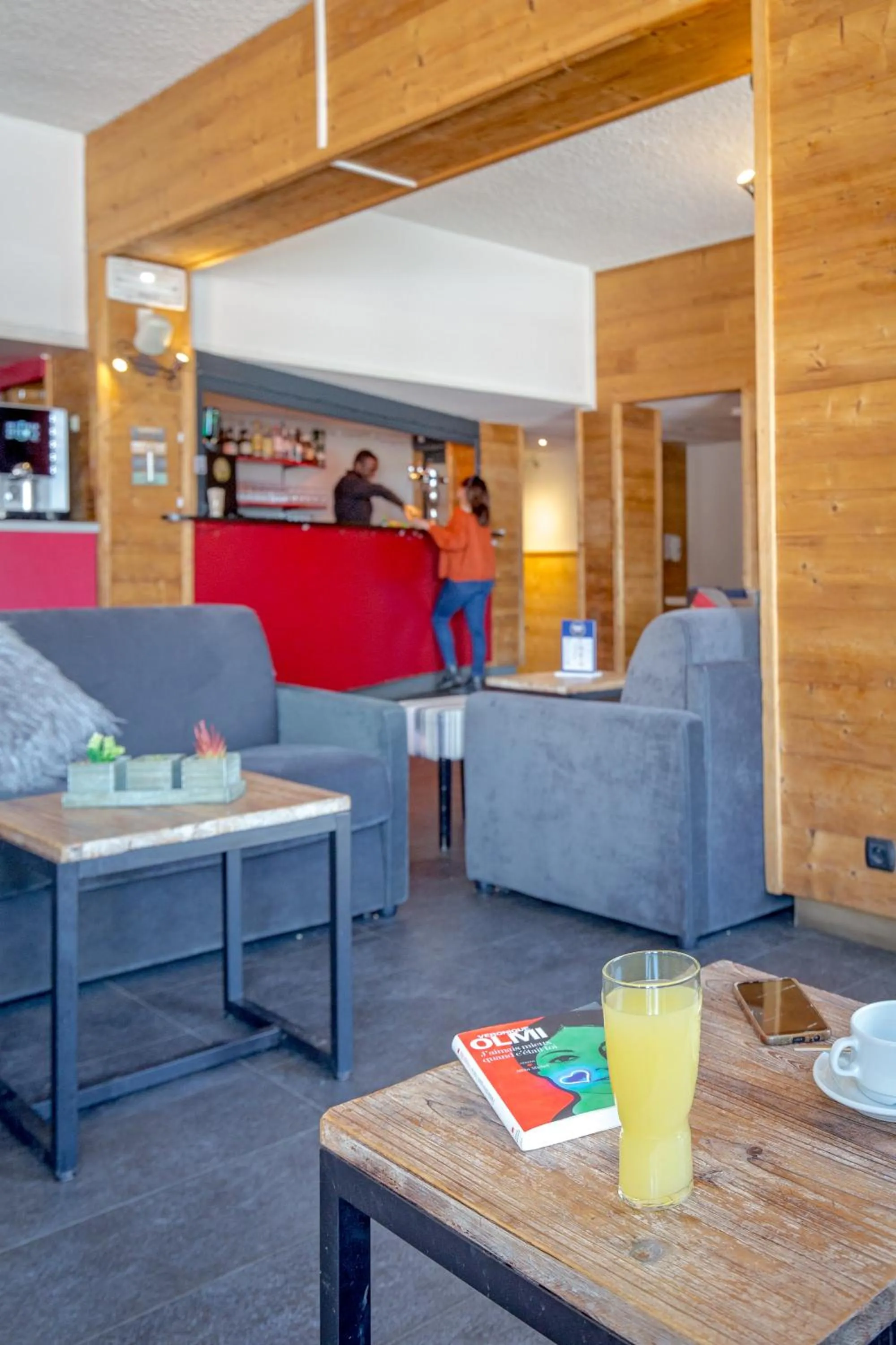Lounge or bar in SOWELL HOTELS Le Pas du Loup