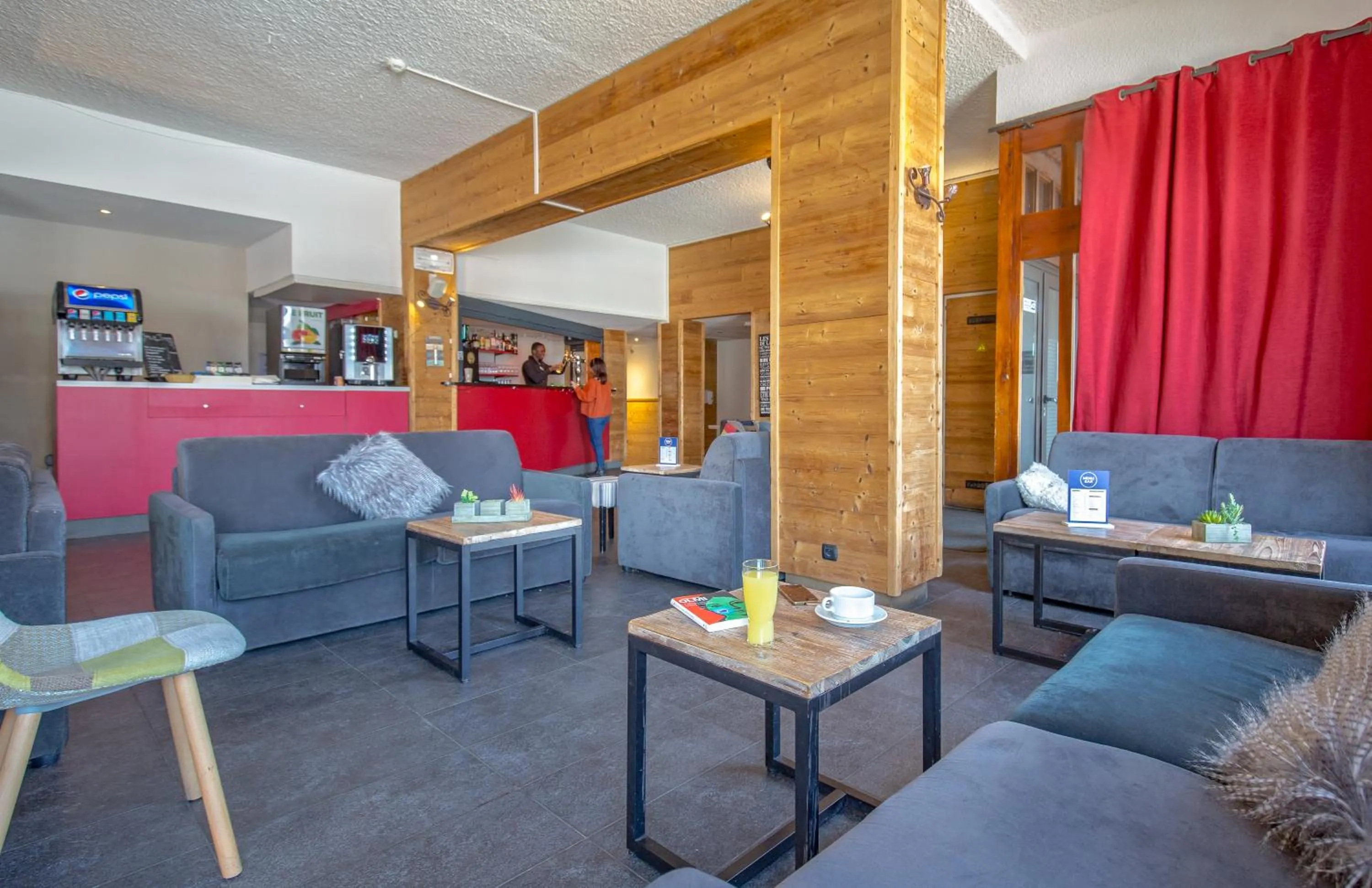 Lounge or bar in SOWELL HOTELS Le Pas du Loup
