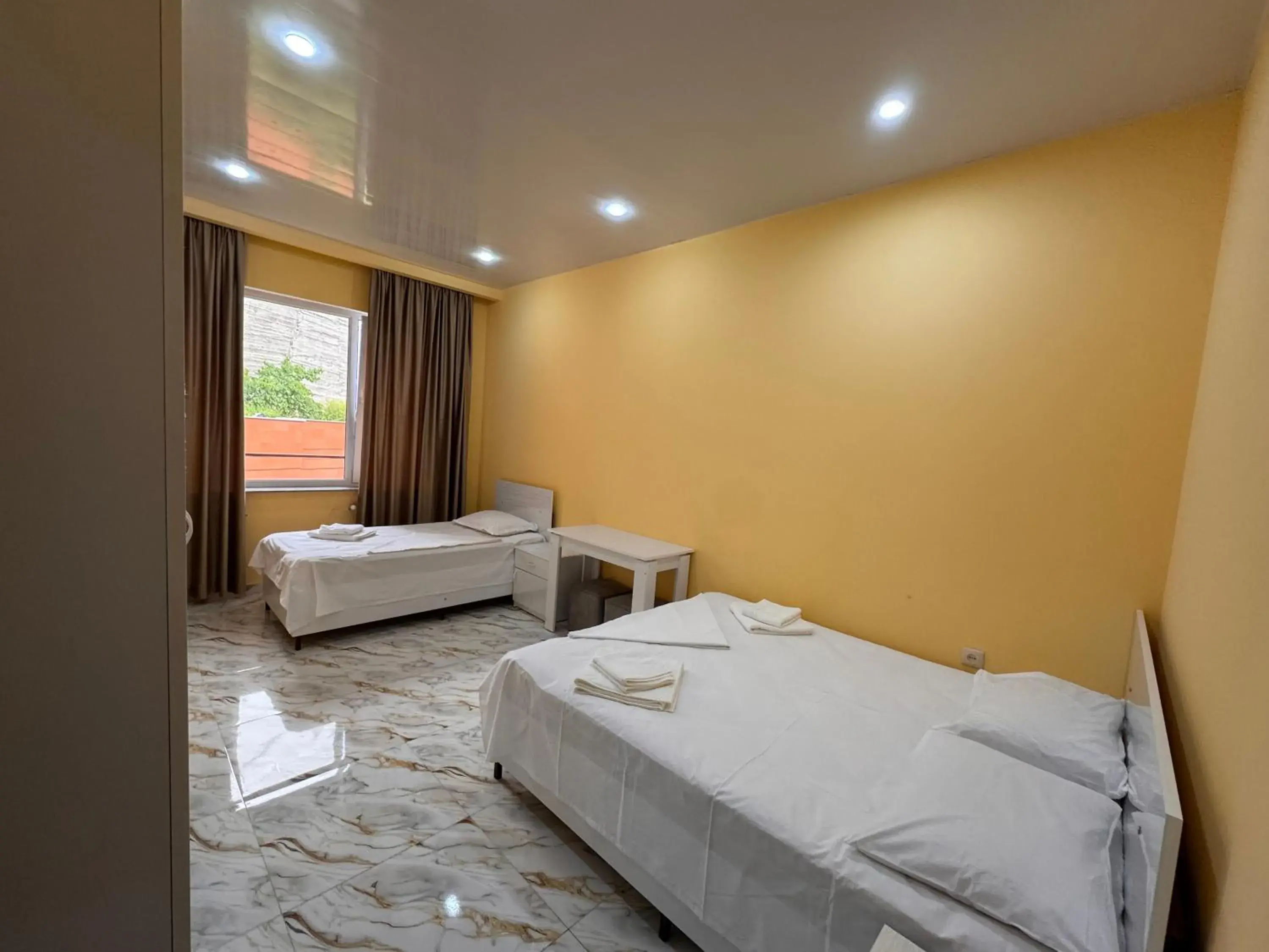 Standard Triple Room in Red Hotel Yerevan Center Standard Triple Room in Red Hotel Yerevan Center