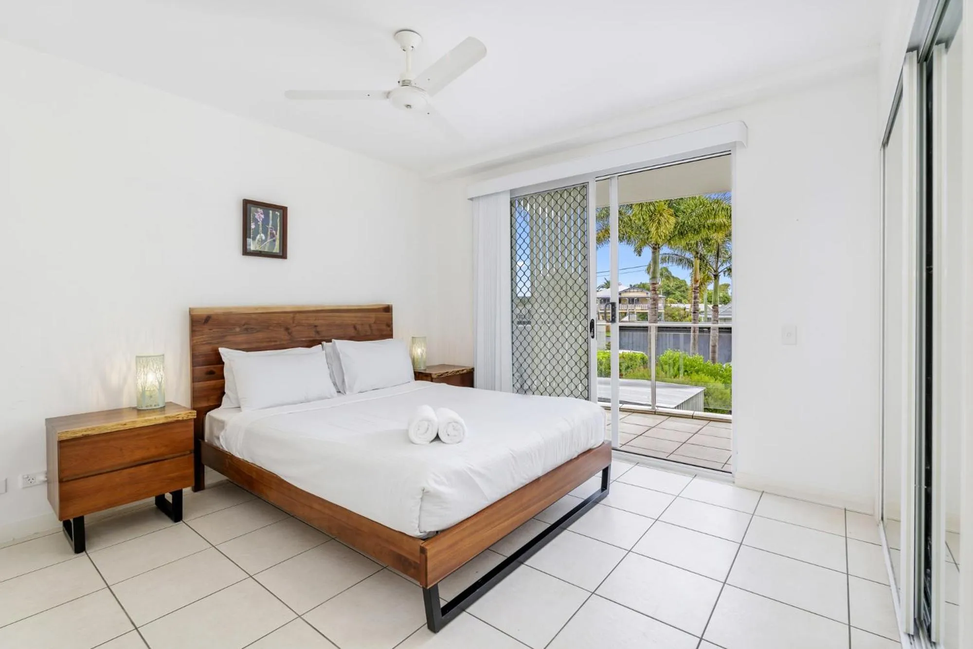 Bed in Tingeera Beachfront Apartments