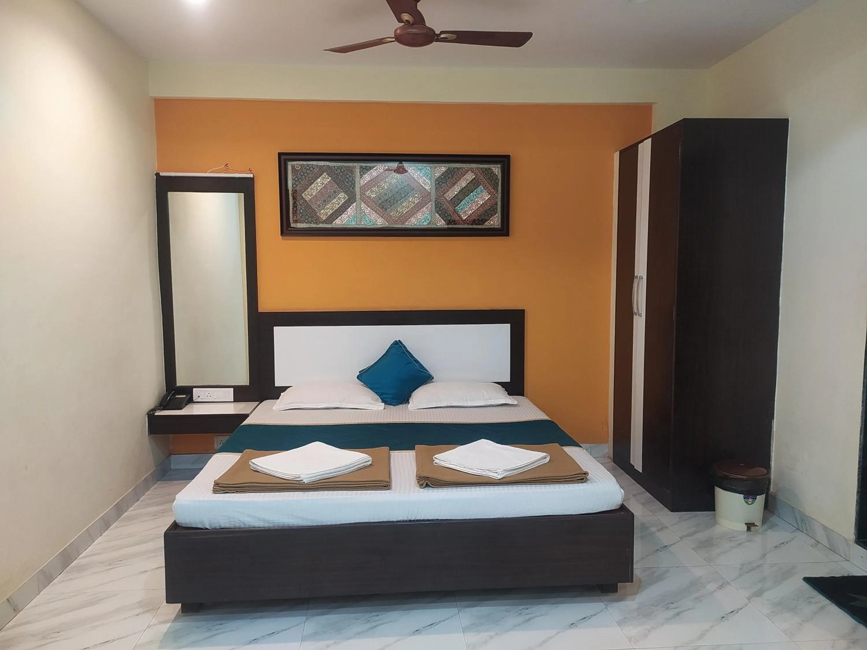 Bed in Sea Winds Hotel, Guhagar