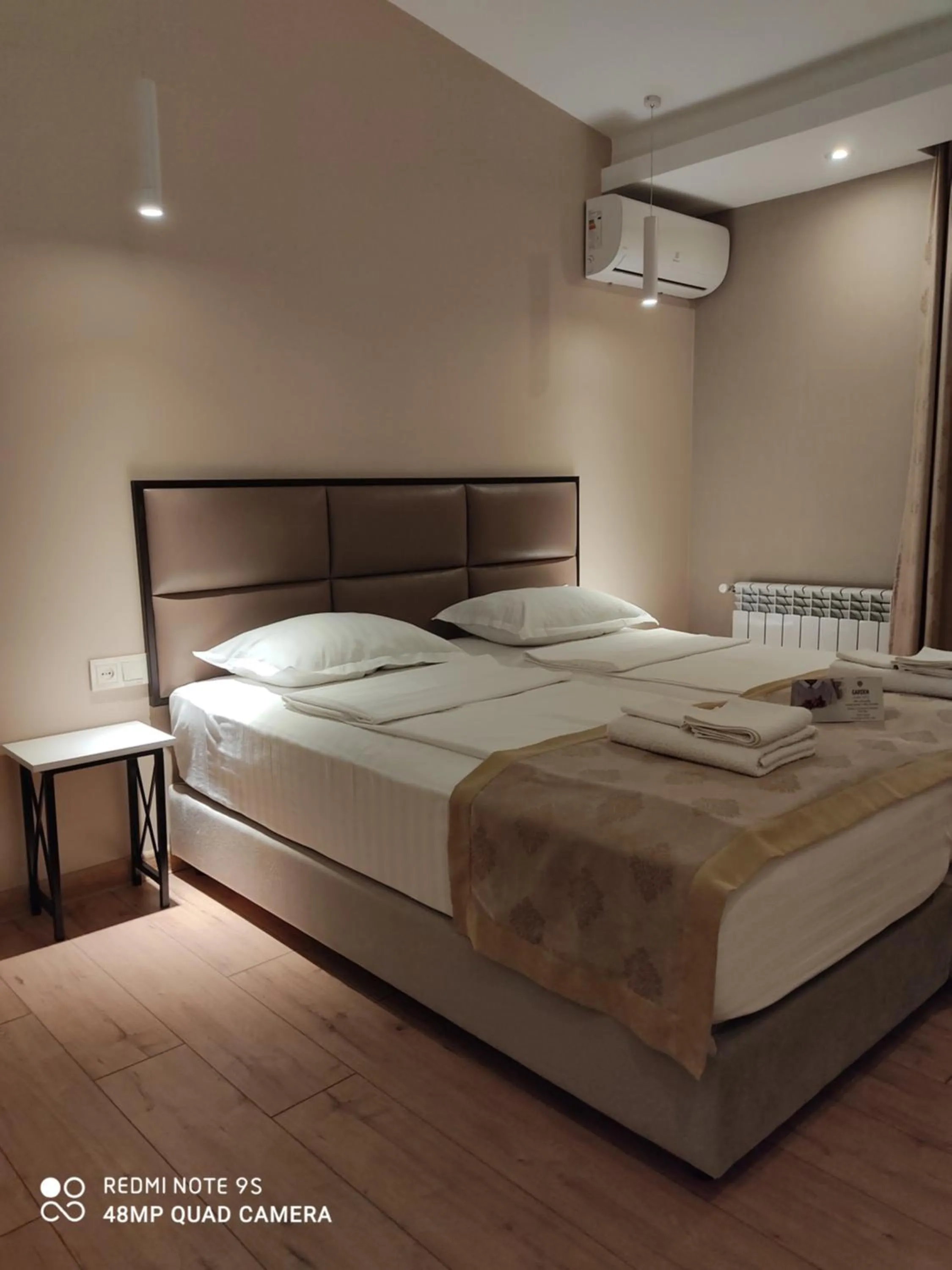Bed in Garden Lounge Hotel