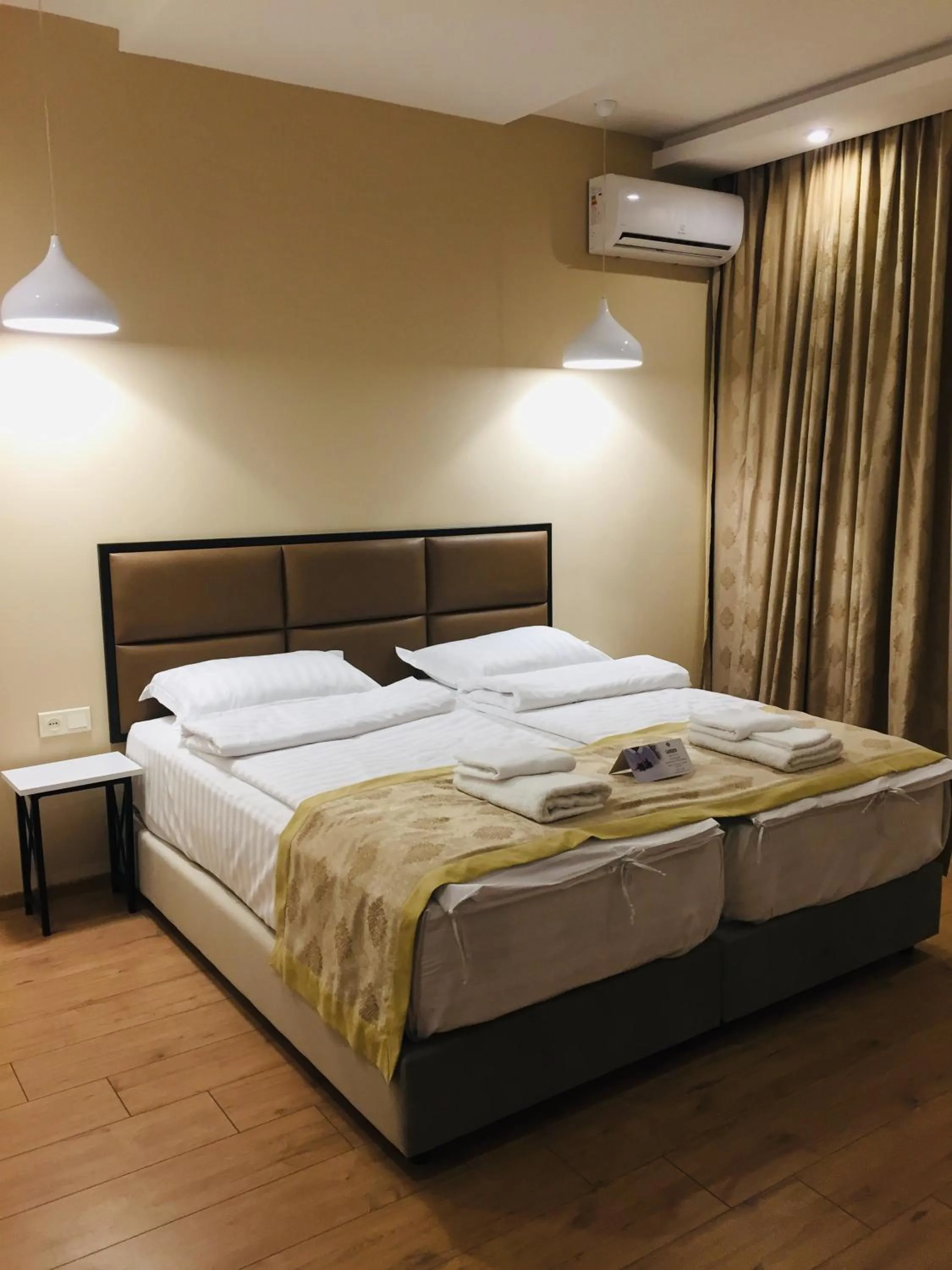Bed in Garden Lounge Hotel
