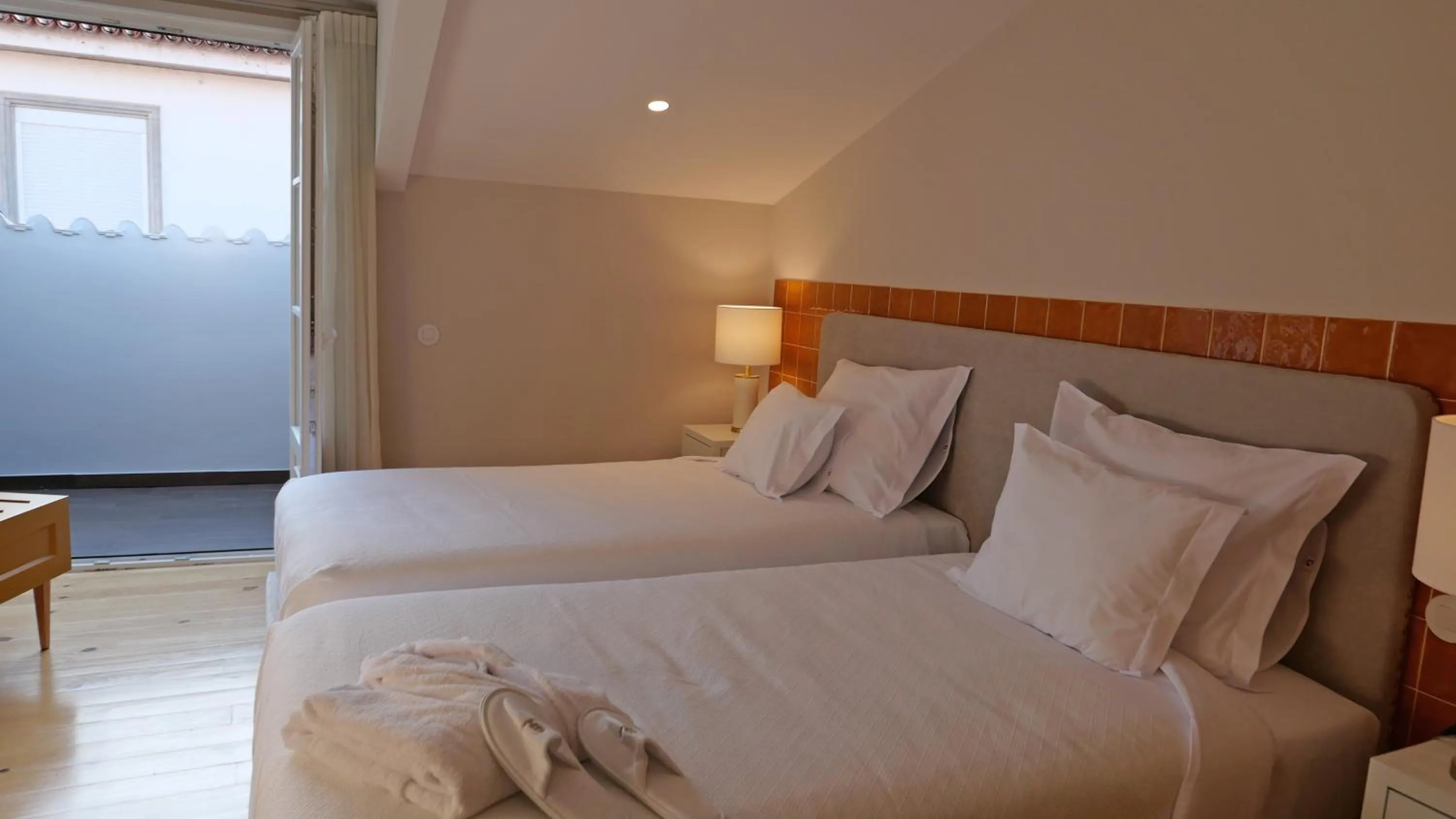 Bed in Casa dos Ofícios Hotel