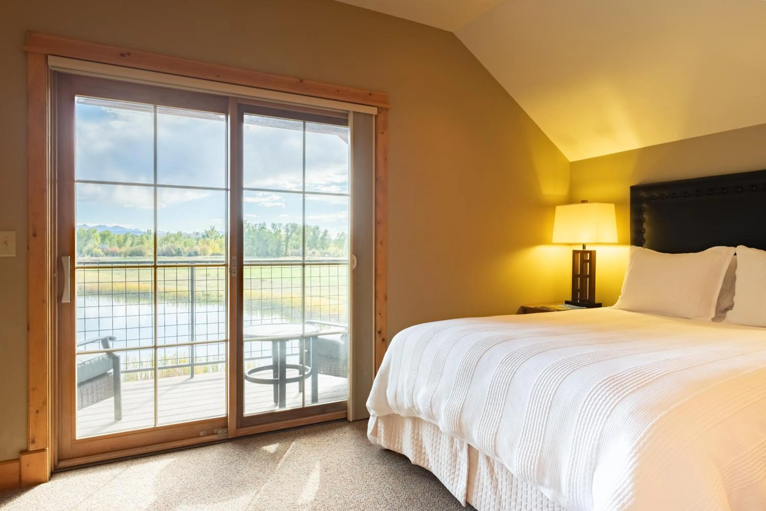 Bed in Gallatin River Lodge