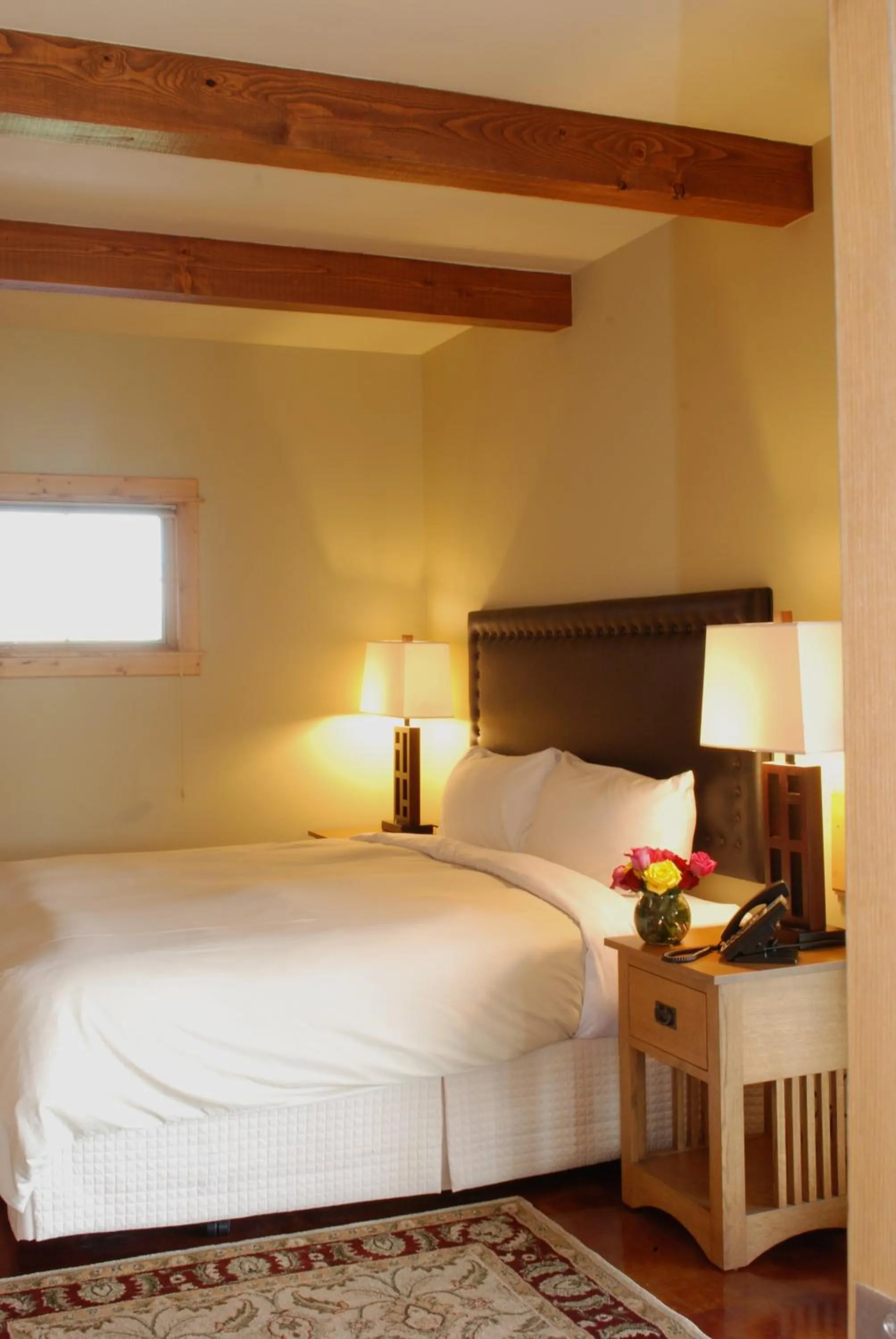 Bed in Gallatin River Lodge