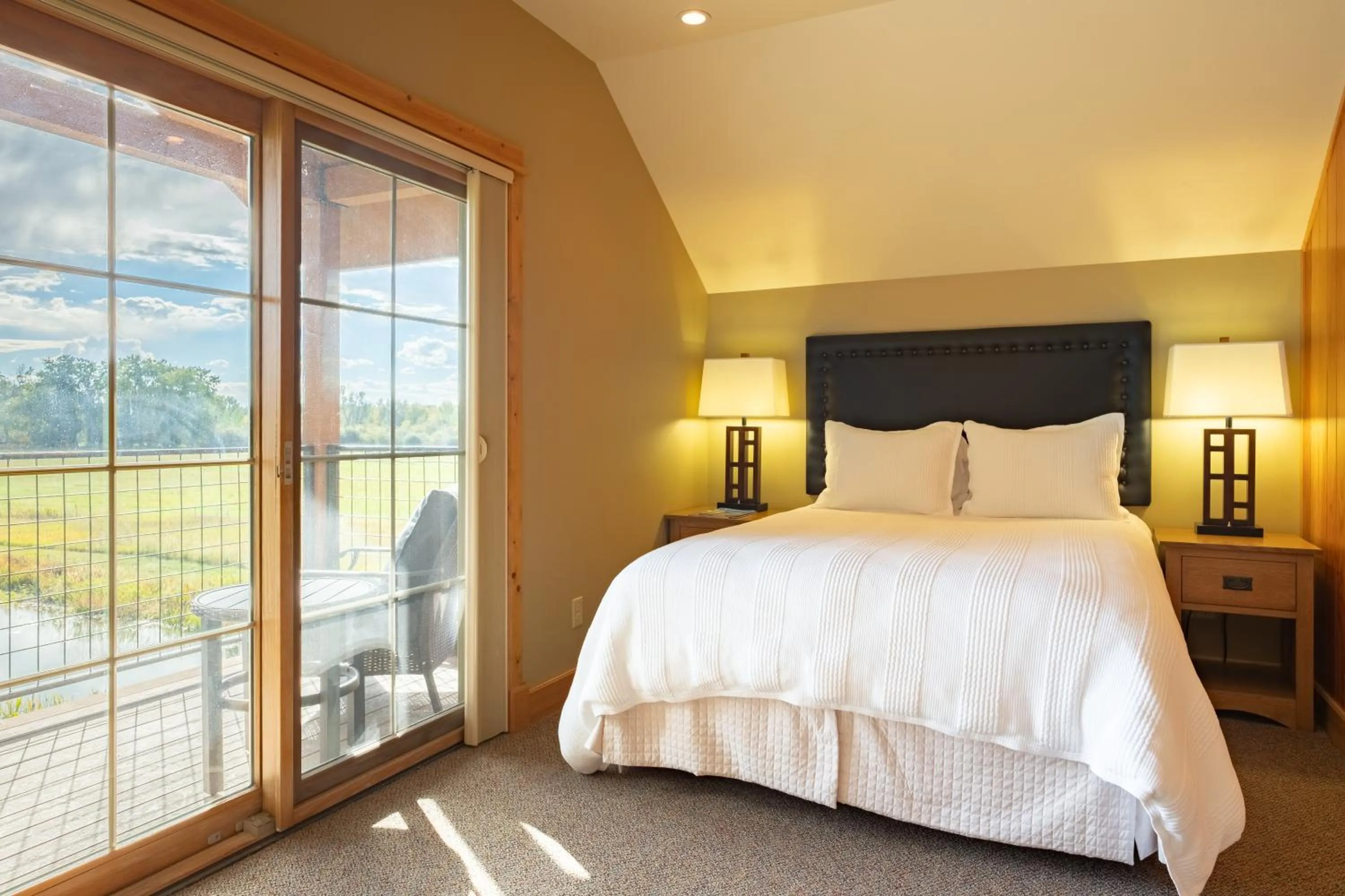 Patio, Bed in Gallatin River Lodge