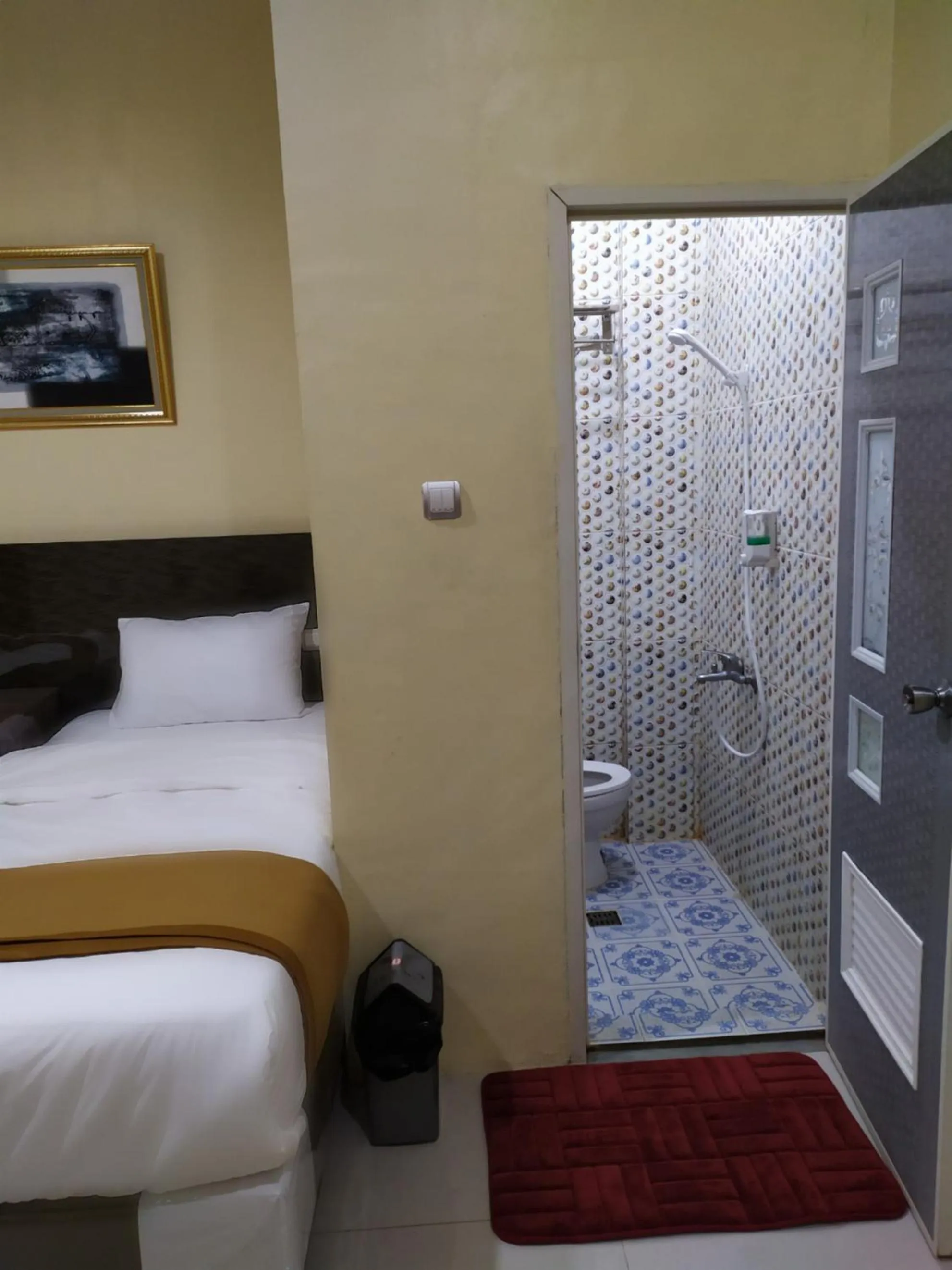 Bed in Hotel Grand Royal