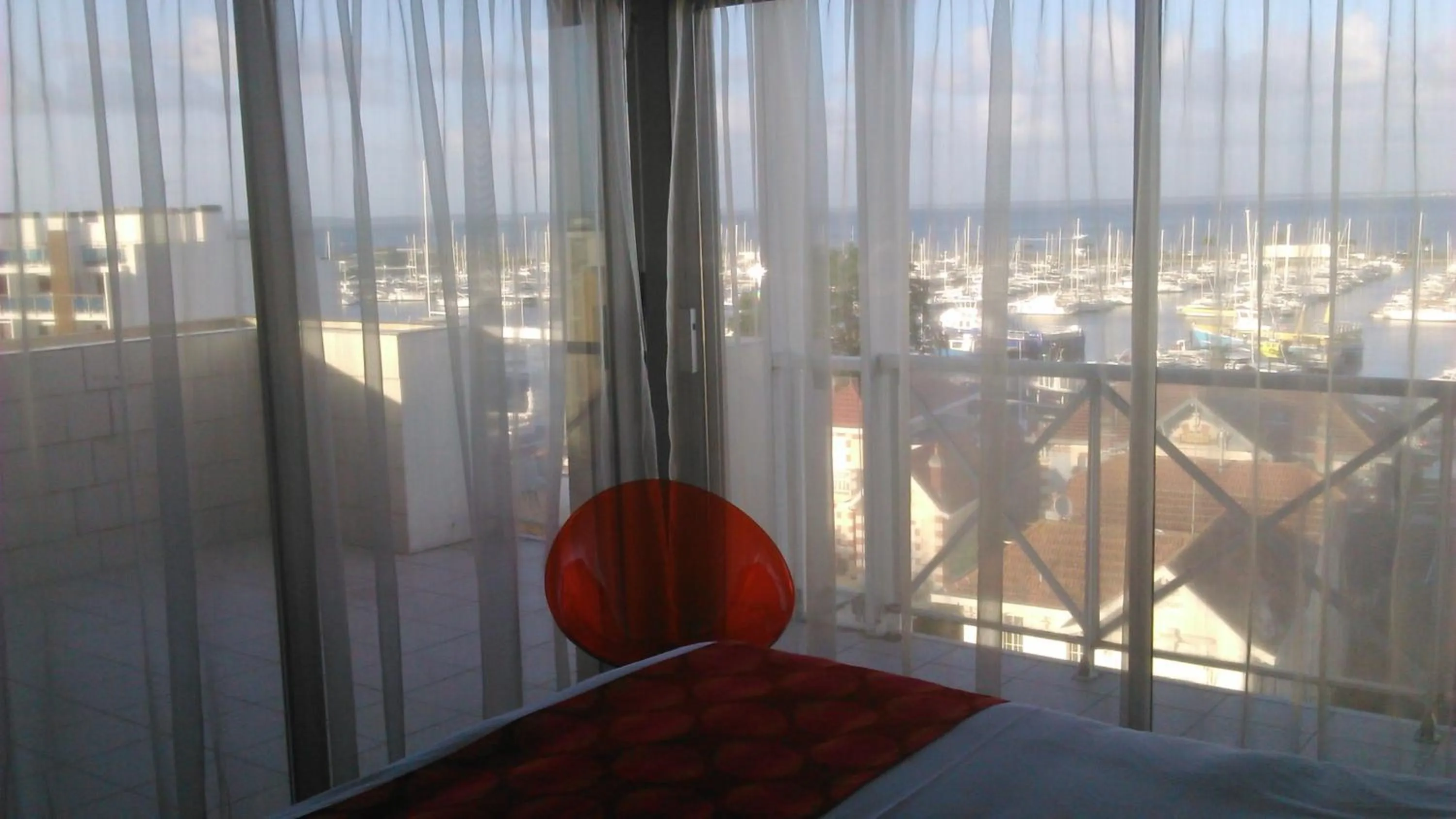 View (from property/room), Bed in Hôtel Le Nautic