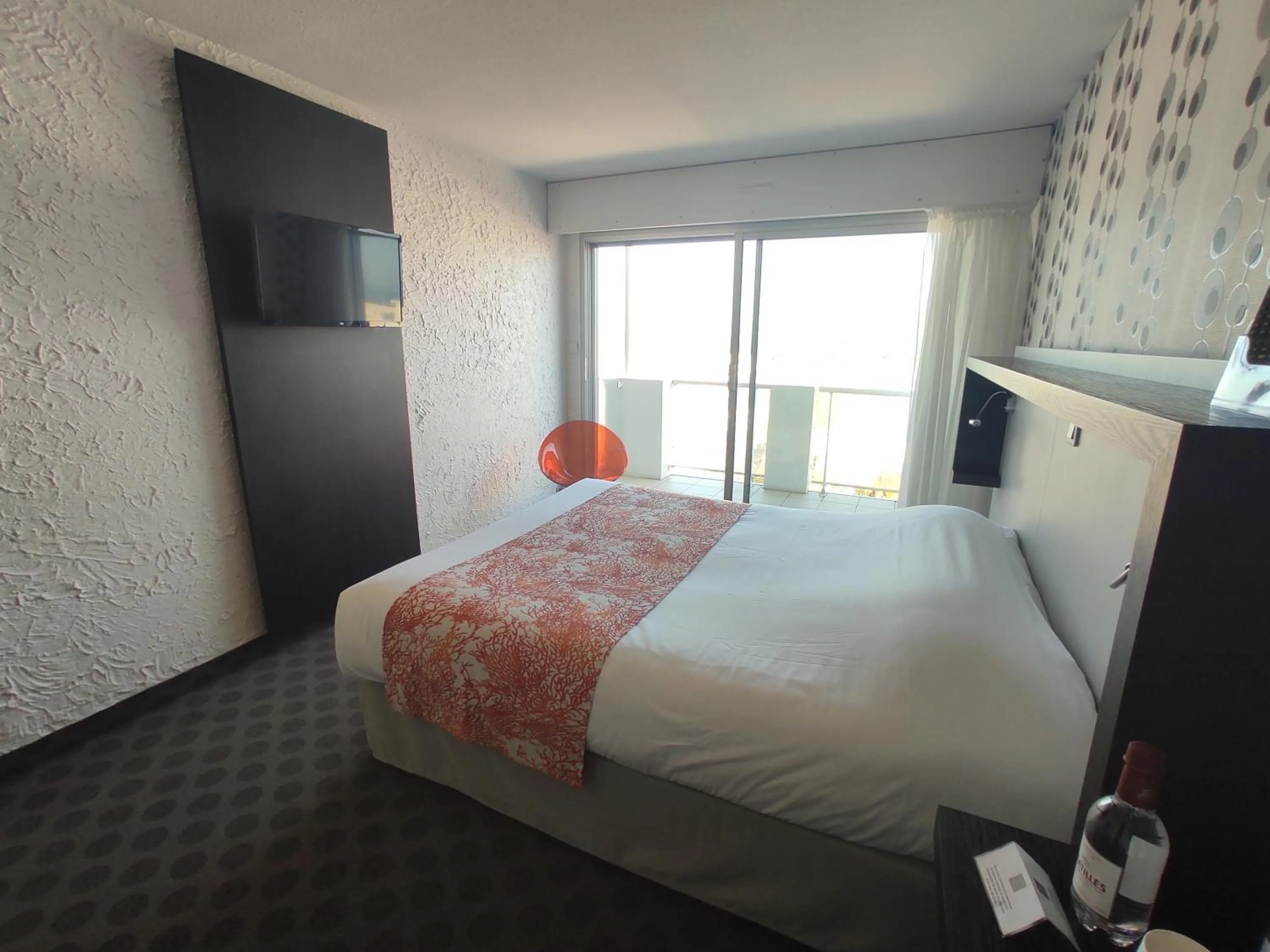 Bed in Hôtel Le Nautic