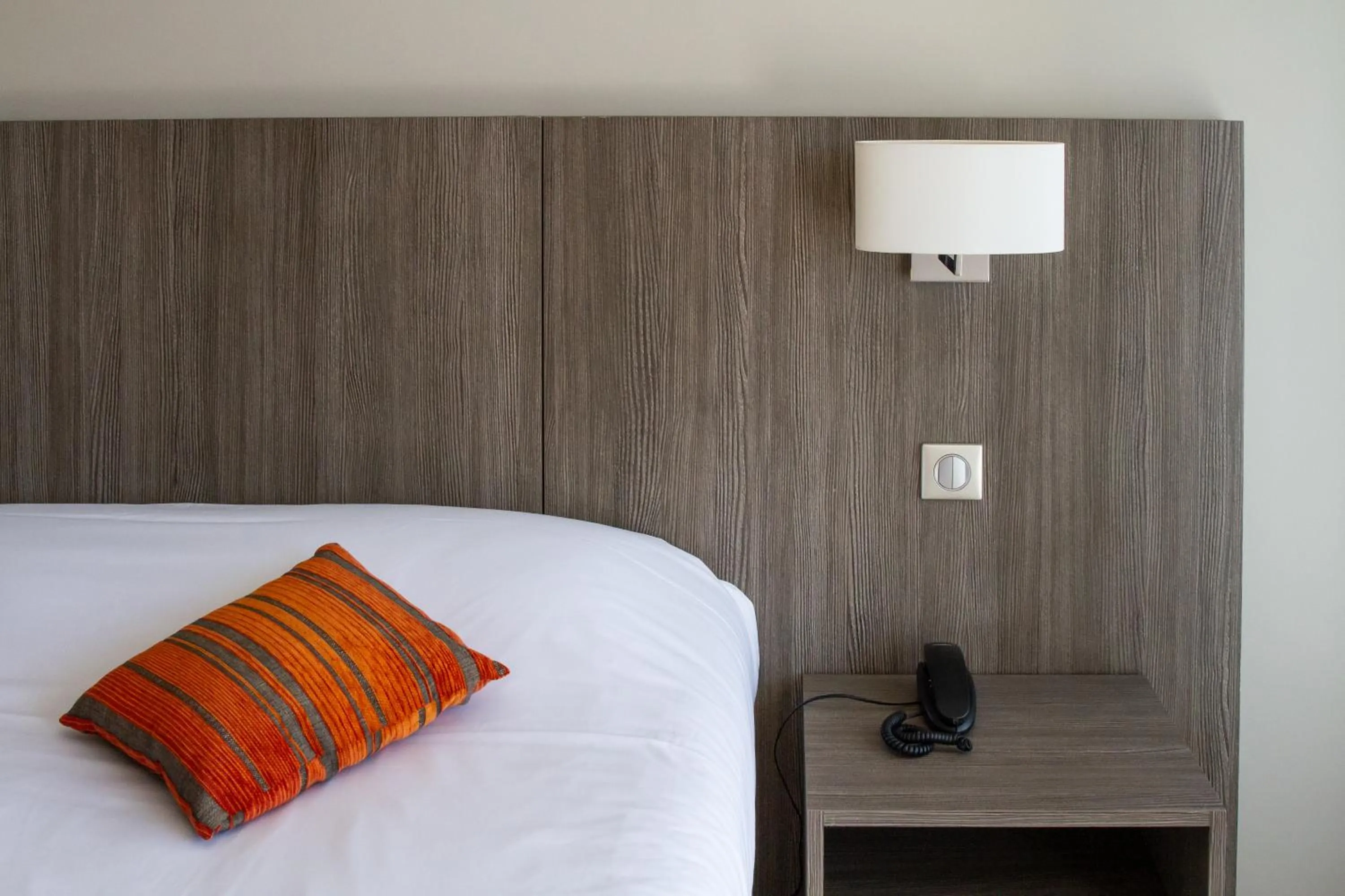 Bed in Hôtel Le Nautic