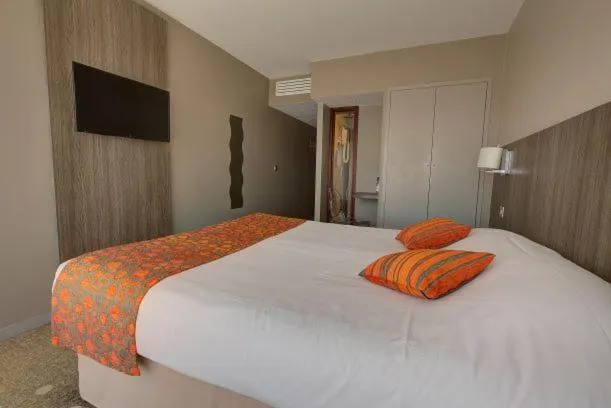 Photo of the whole room, Bed in Hôtel Le Nautic