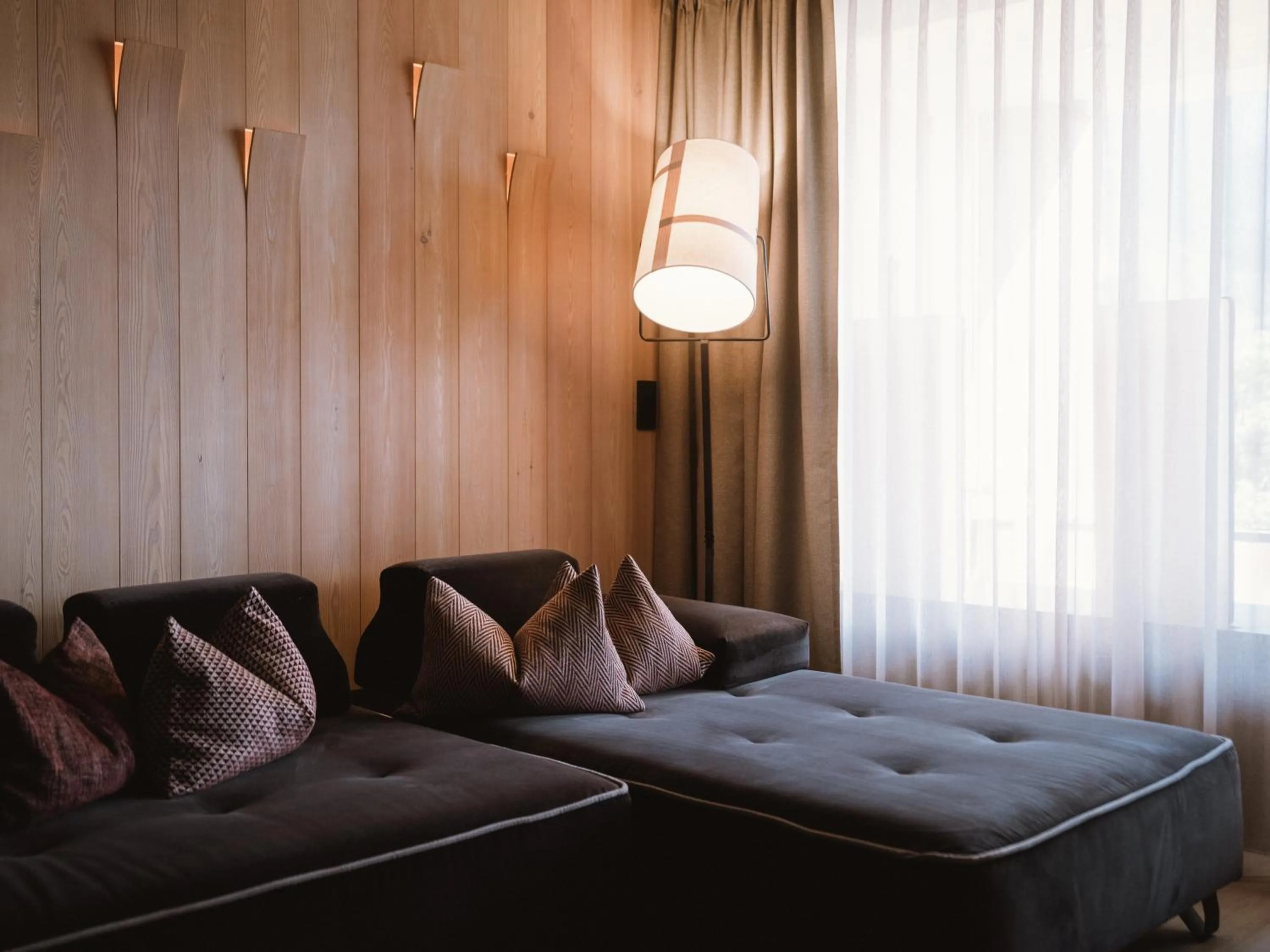 Living room, Bed in Lindenhof Pure Luxury & Spa DolceVita Resort