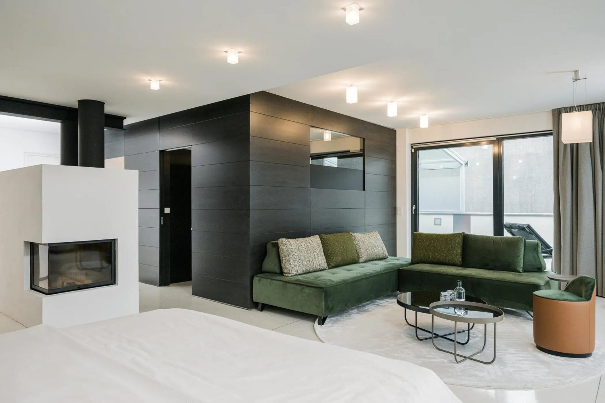 Living room, Bed in Lindenhof Pure Luxury & Spa DolceVita Resort