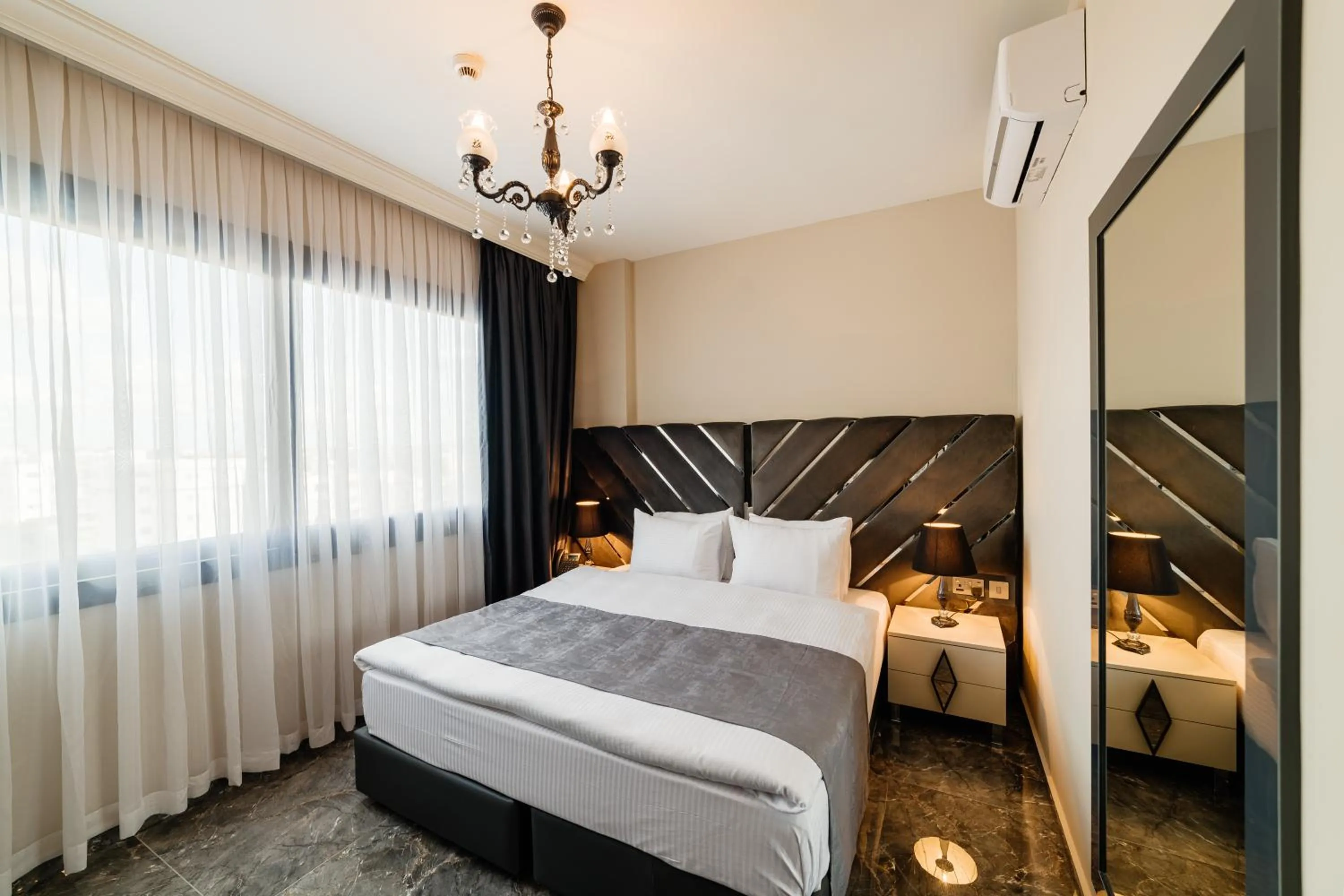 Bed in Royal Palace Hotel