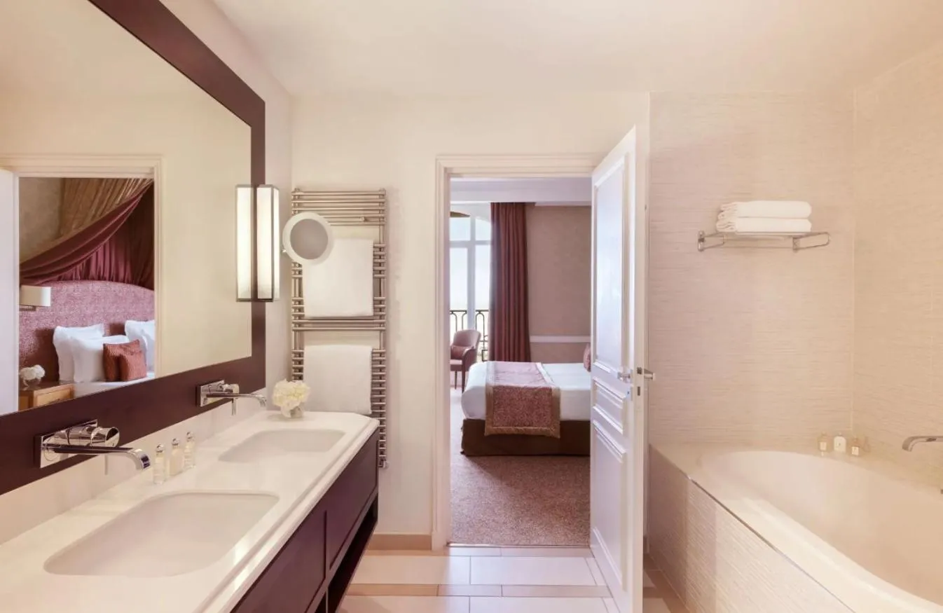 Bathroom, Bed in Hôtel Barrière Le Royal Deauville