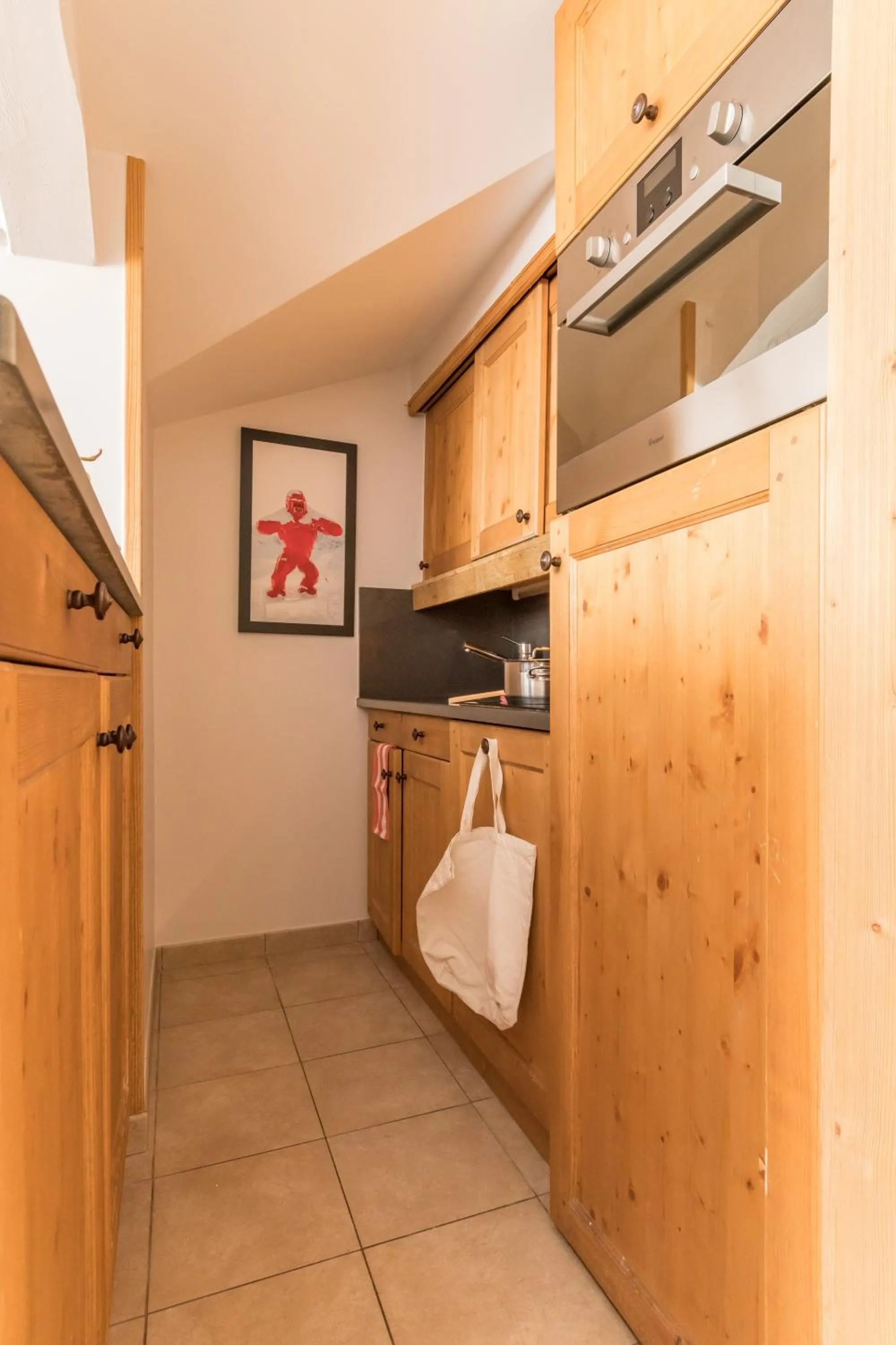 Kitchen or kitchenette in Résidence Pierre & Vacances Premium Les Chalets du Forum