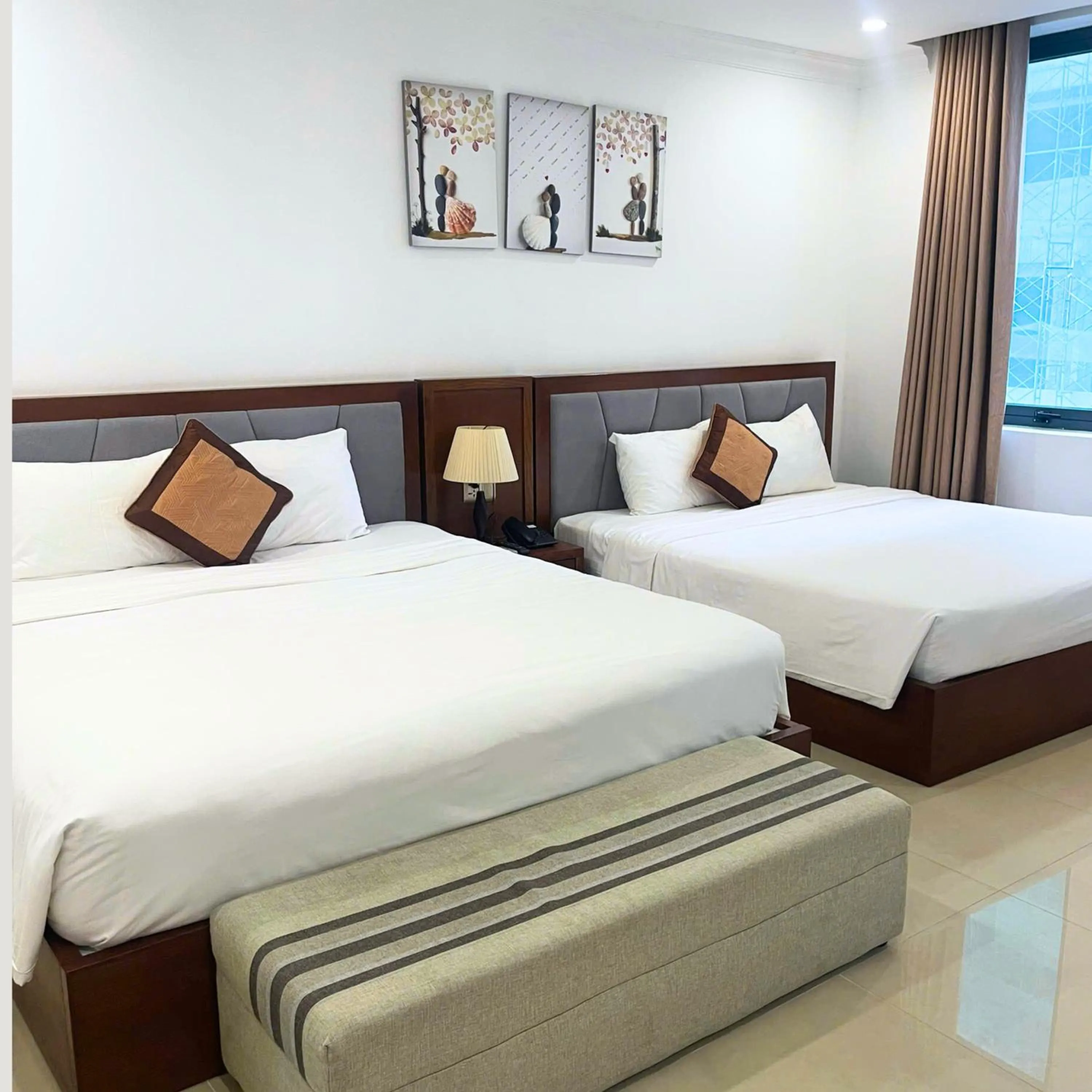 Bed in K Hotel Sauna and Massage