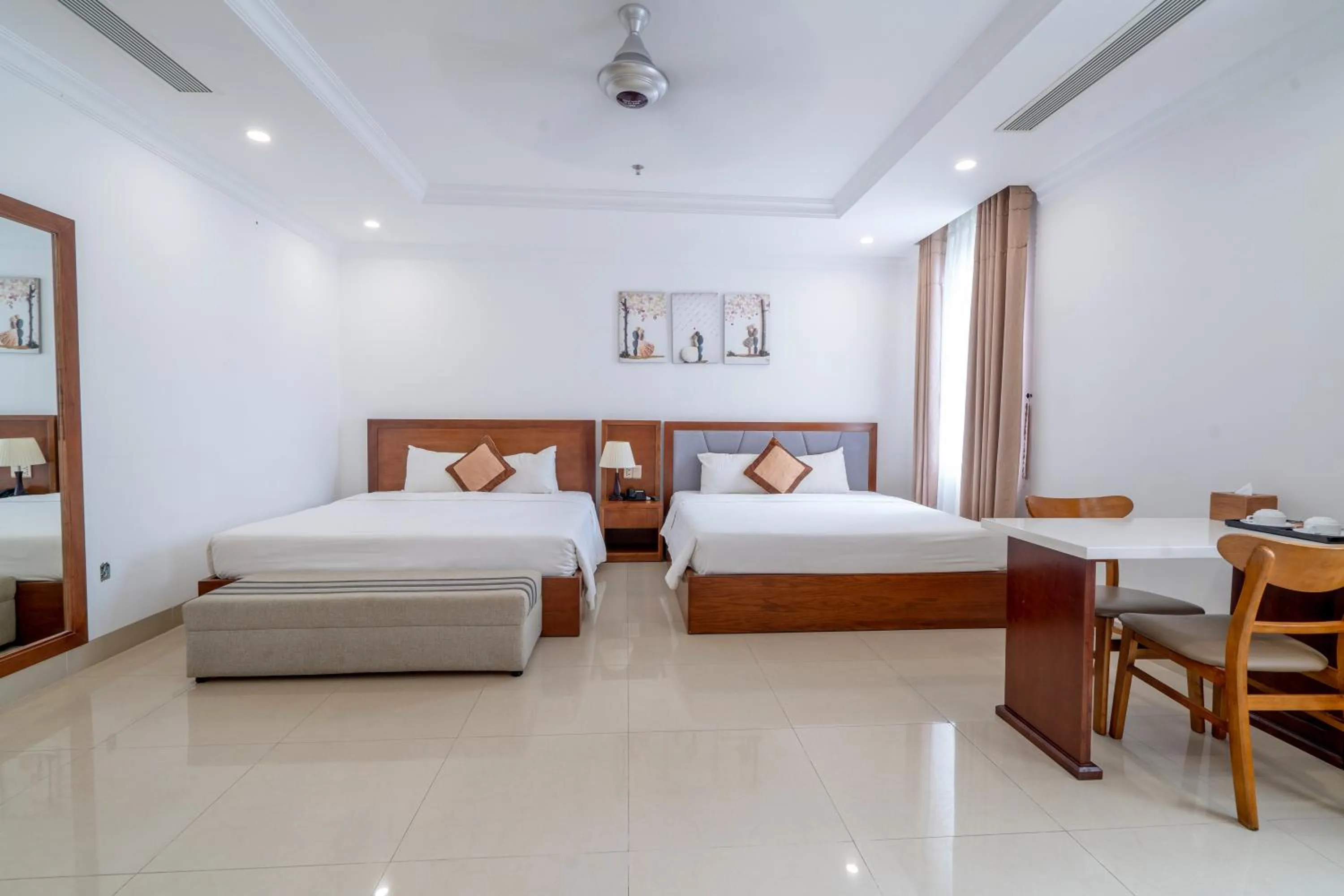 Bed in K Hotel Sauna and Massage