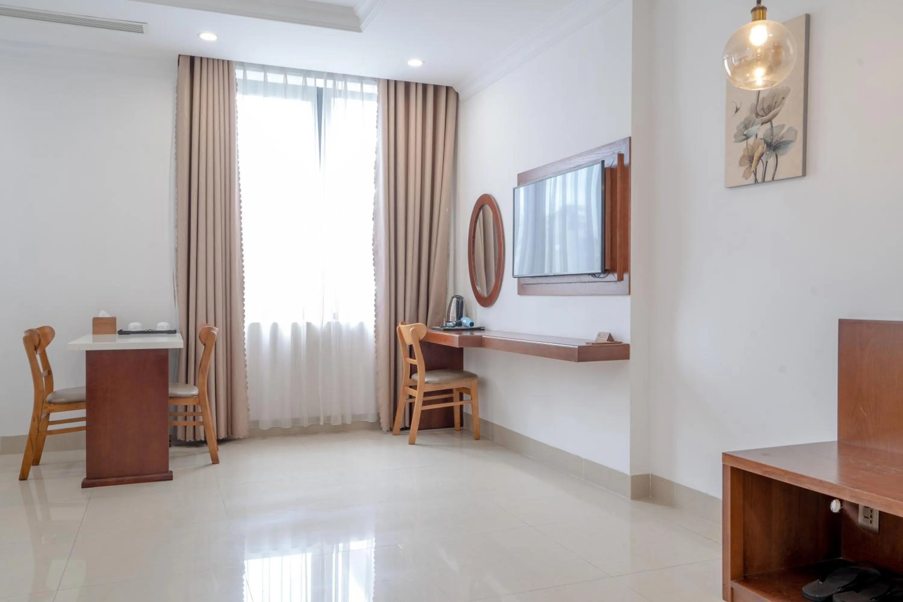 Bed in K Hotel Sauna and Massage