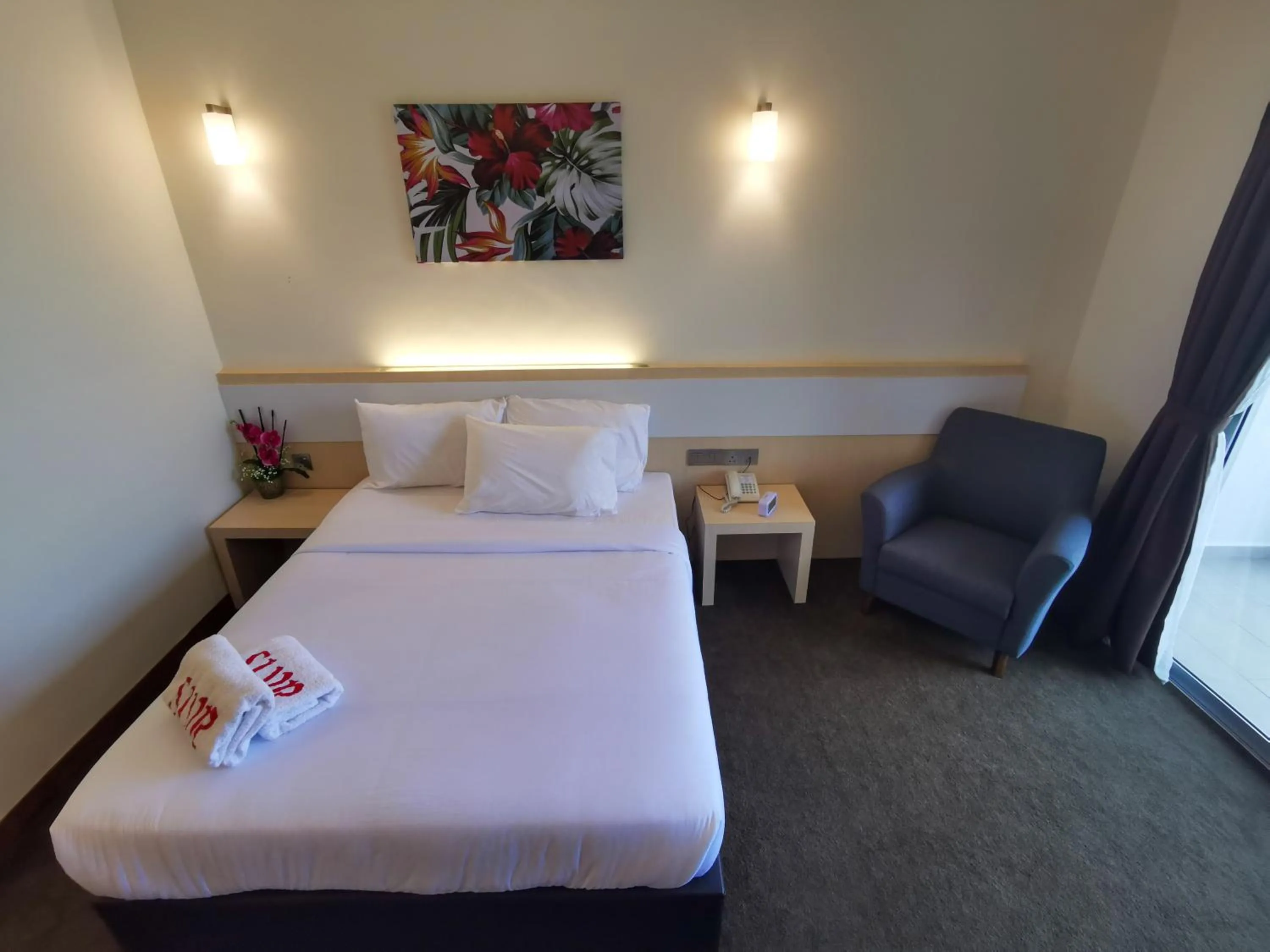 Bed in SERDANG LAKE VIEW RESORT