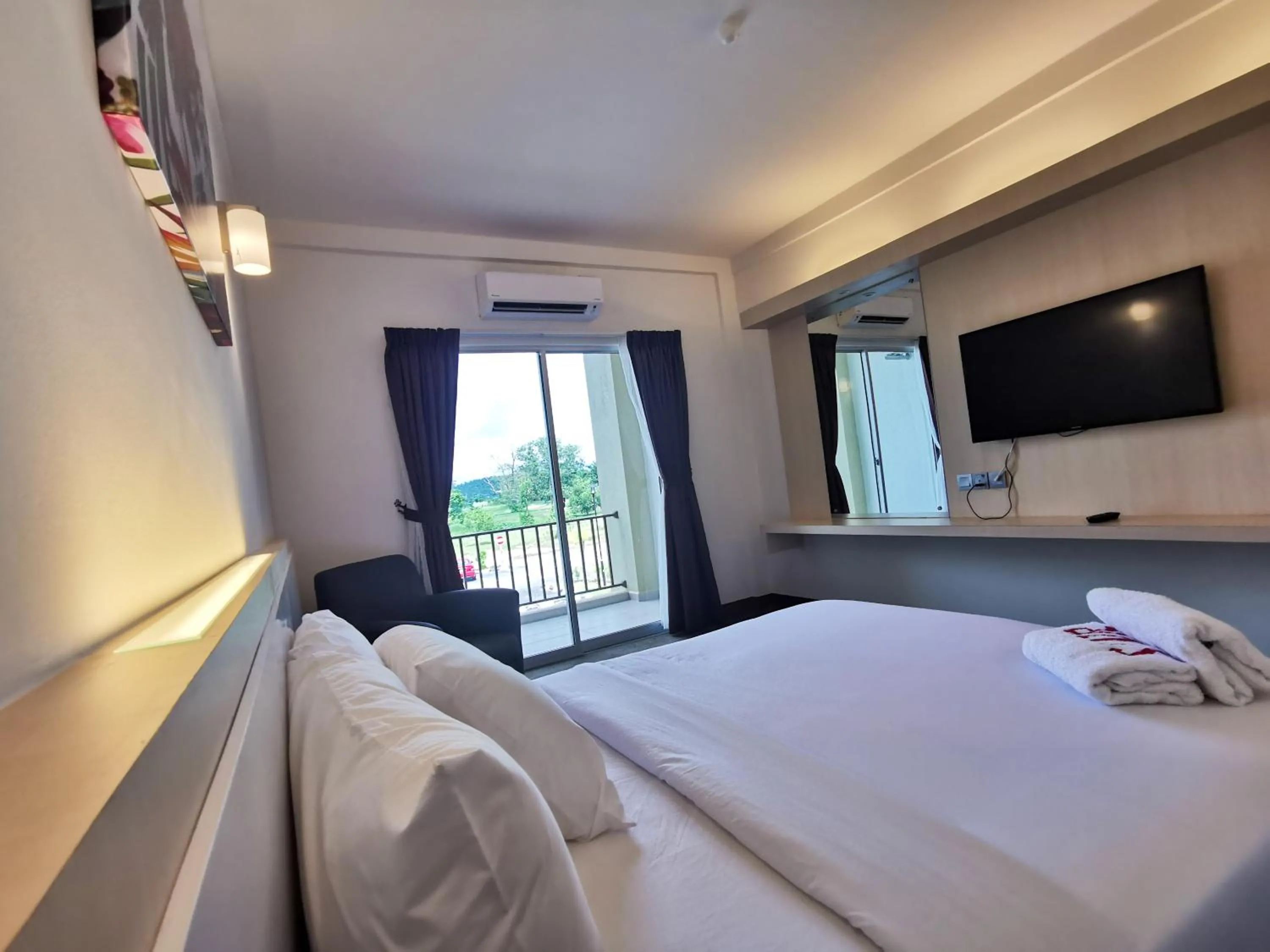 Bed in SERDANG LAKE VIEW RESORT