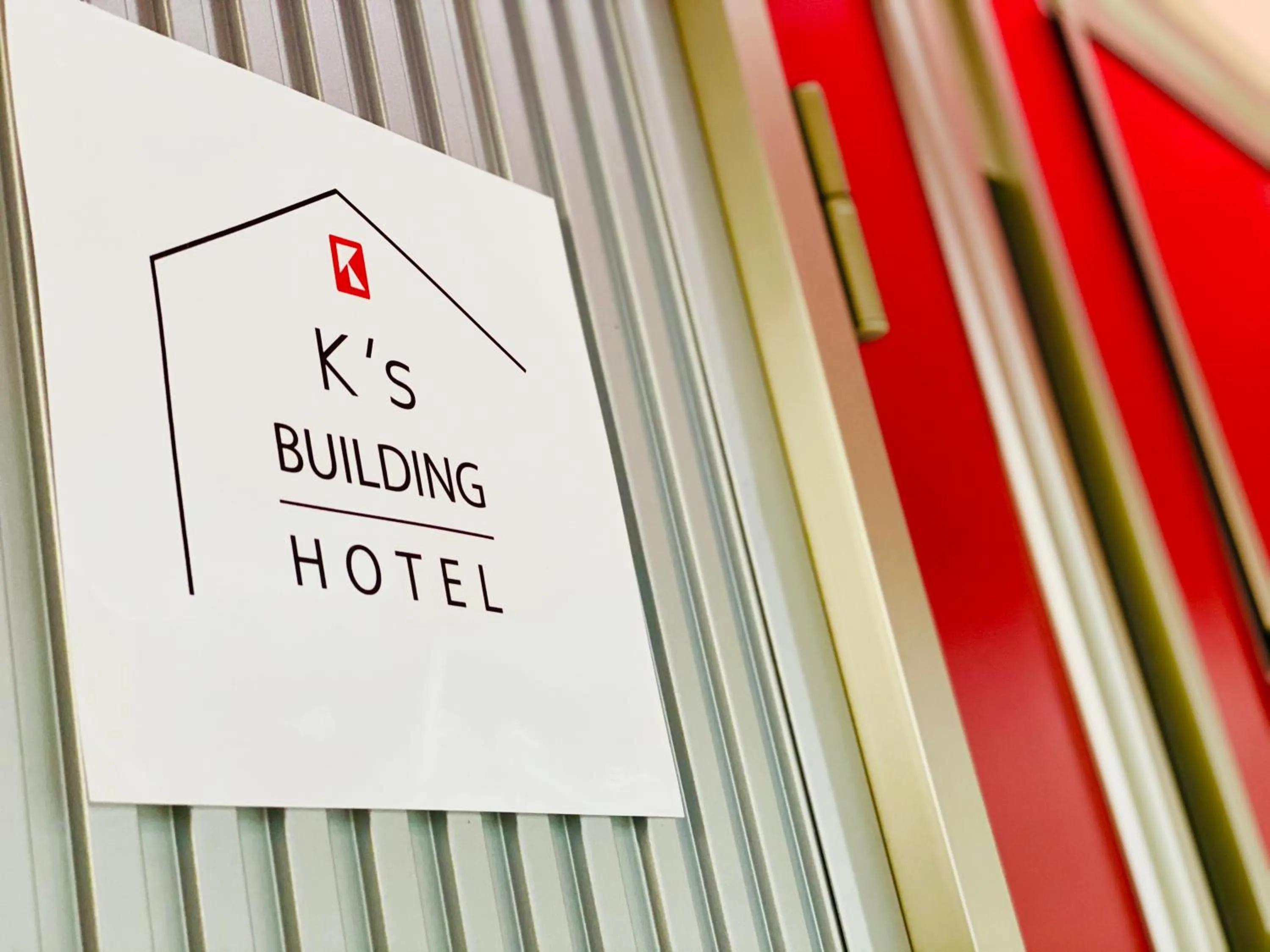 Property logo or sign in K's Hotel