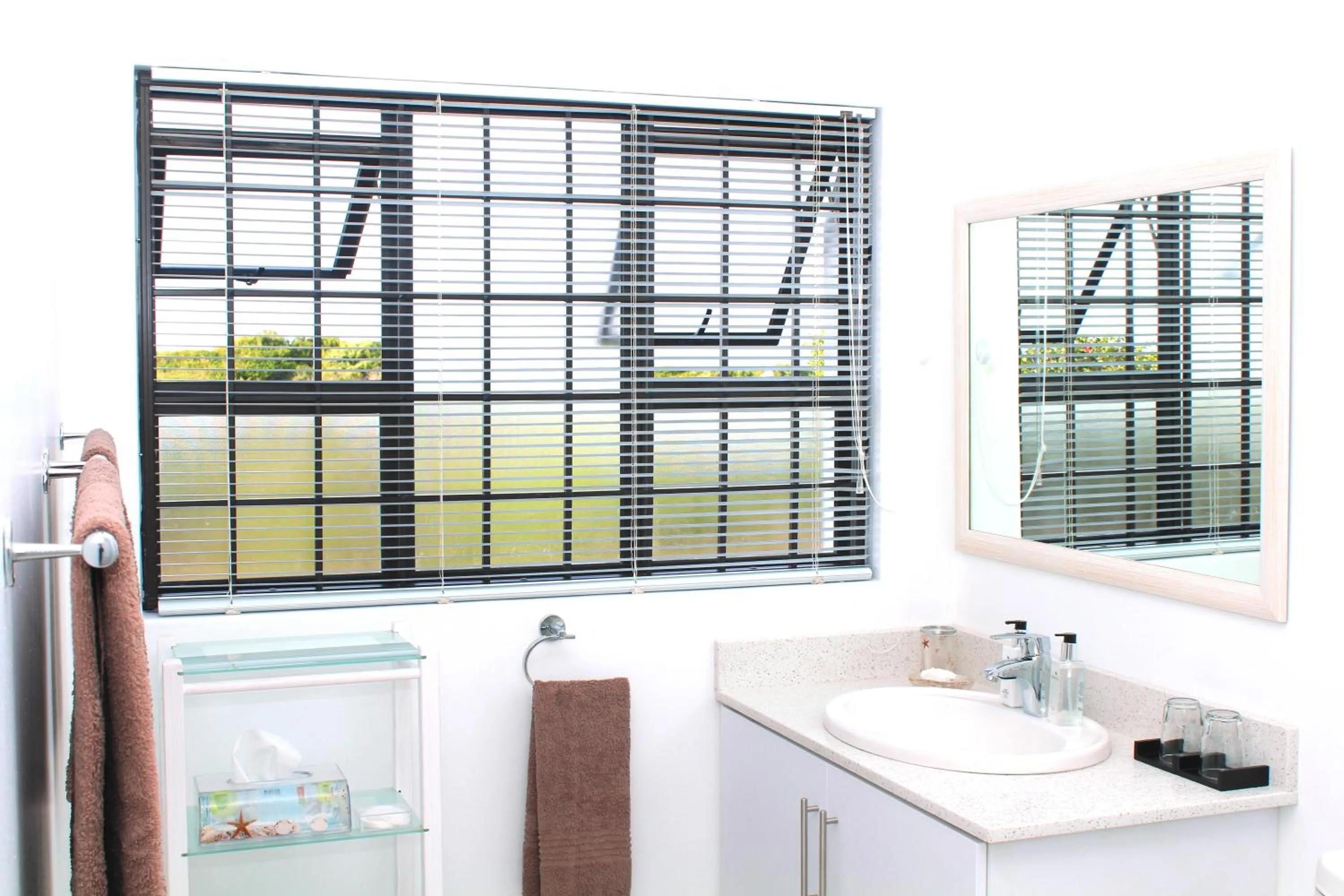 Bathroom in Beach Break B&B - Deluxe Suites