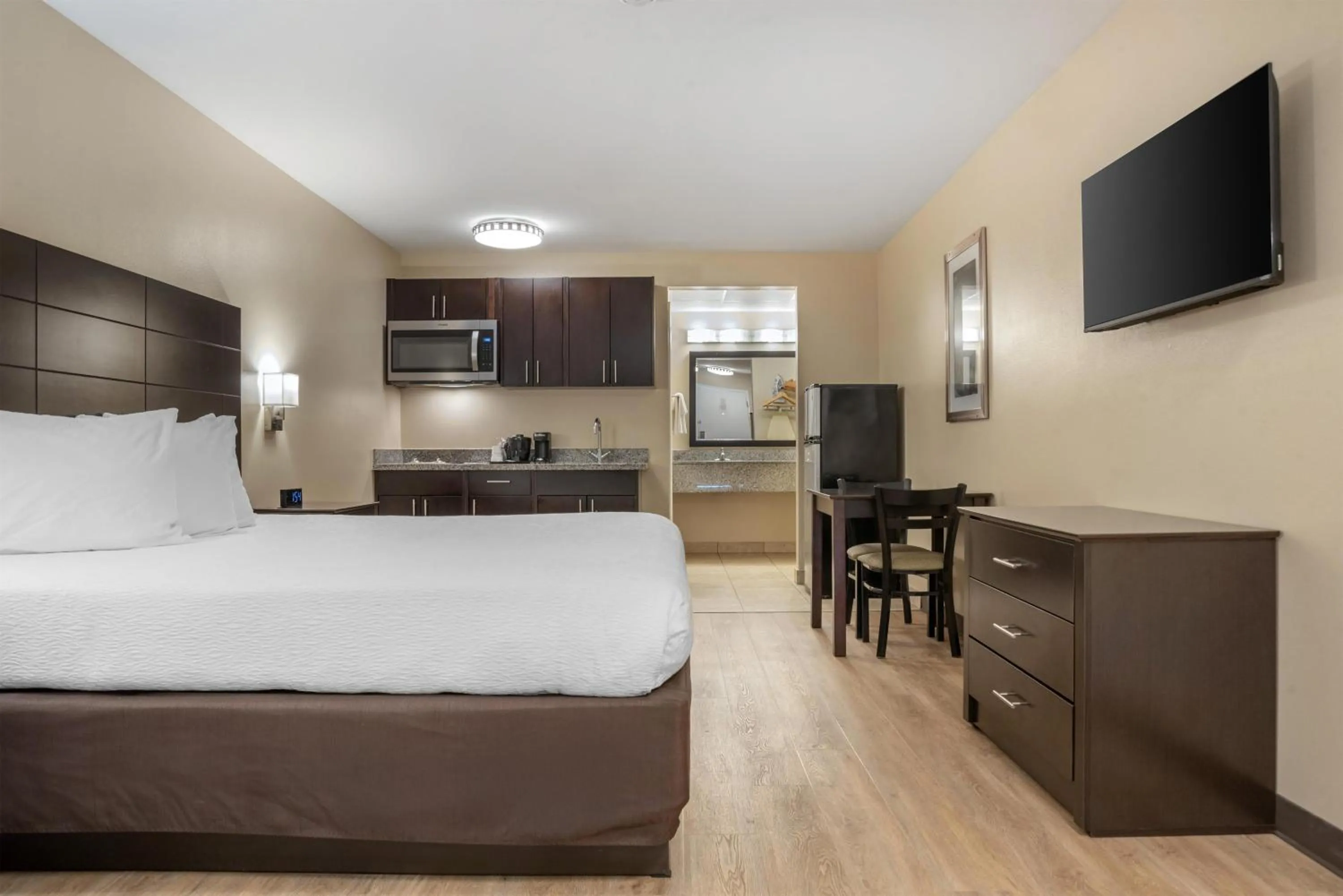 Bedroom in SureStay Studio by Best Western Gonzales