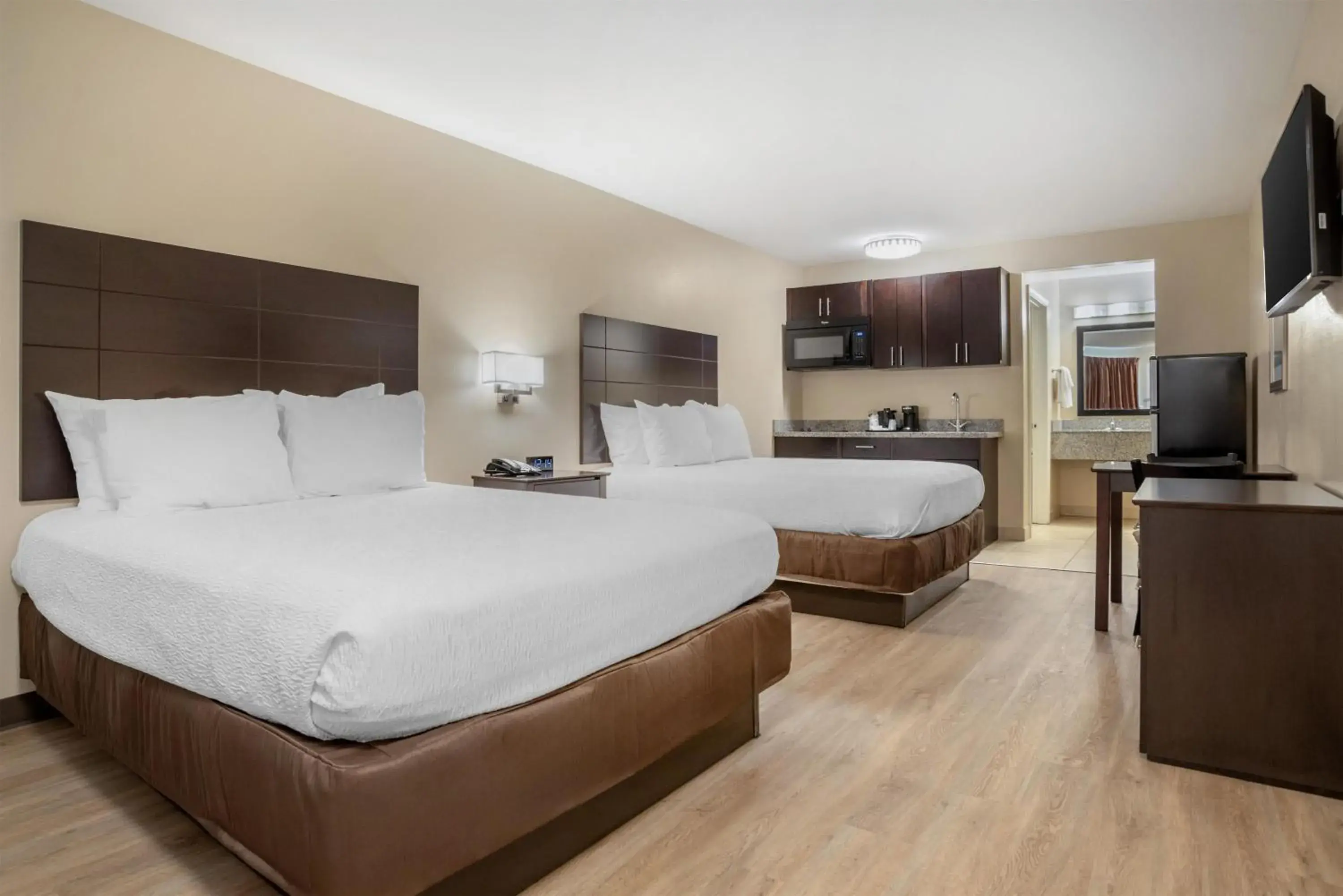 Queen Room with Two Queen Beds and Kitchenette - Smoking/Second Floor in SureStay Studio by Best Western Gonzales Queen Room with Two Queen Beds and Kitchenette - Smoking/Second Floor in SureStay Studio by Best Western Gonzales