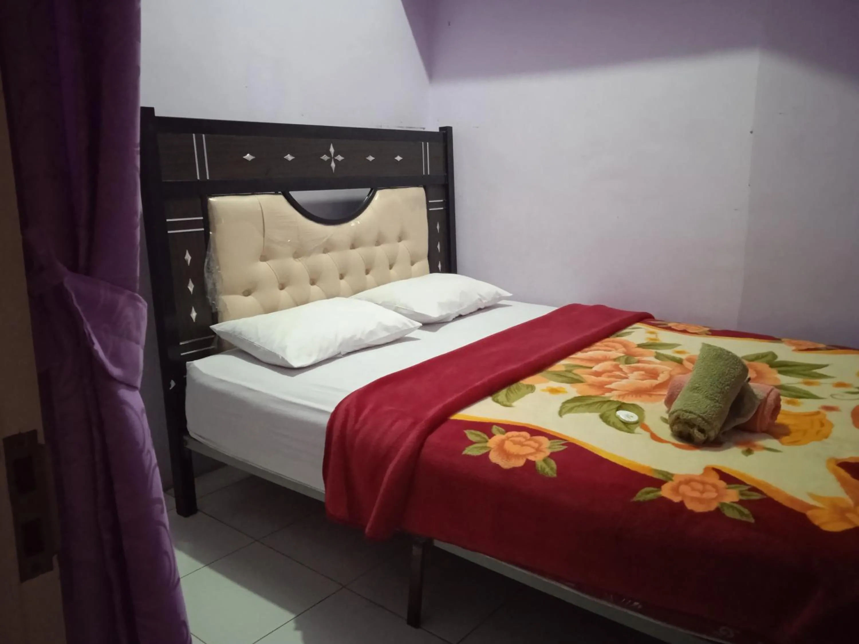 Bedroom in Trivadoh Syariah Hotel