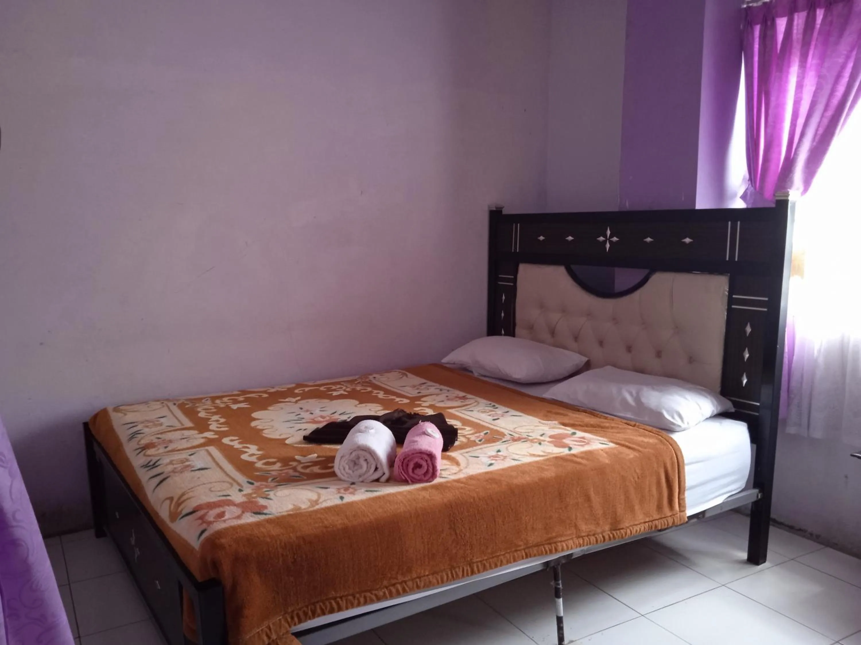 Bedroom in Trivadoh Syariah Hotel