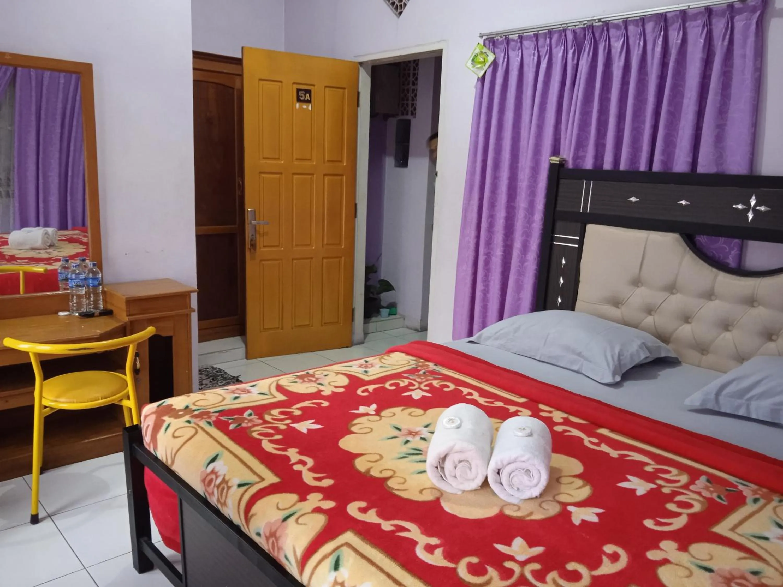 Bedroom in Trivadoh Syariah Hotel