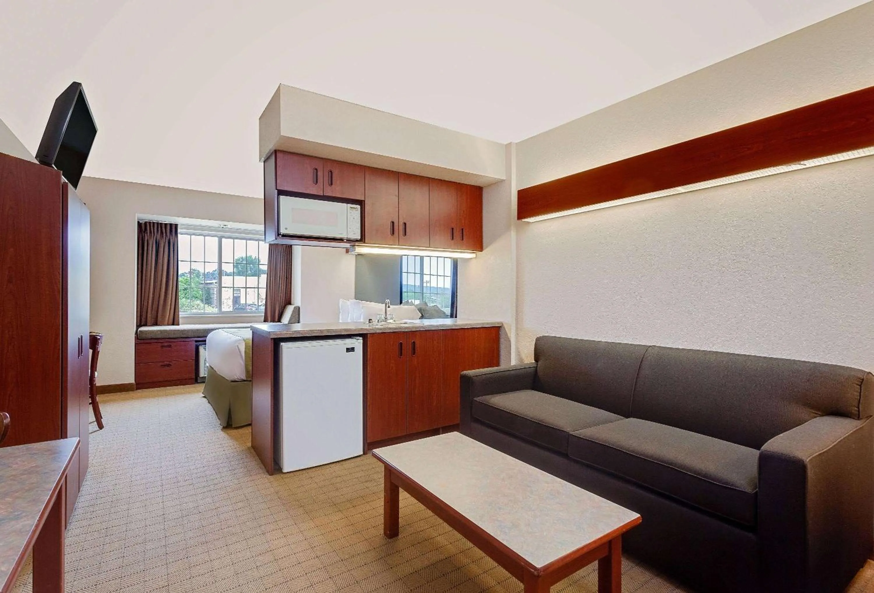 Bed in Microtel Inn & Suites by Wyndham Wellsville