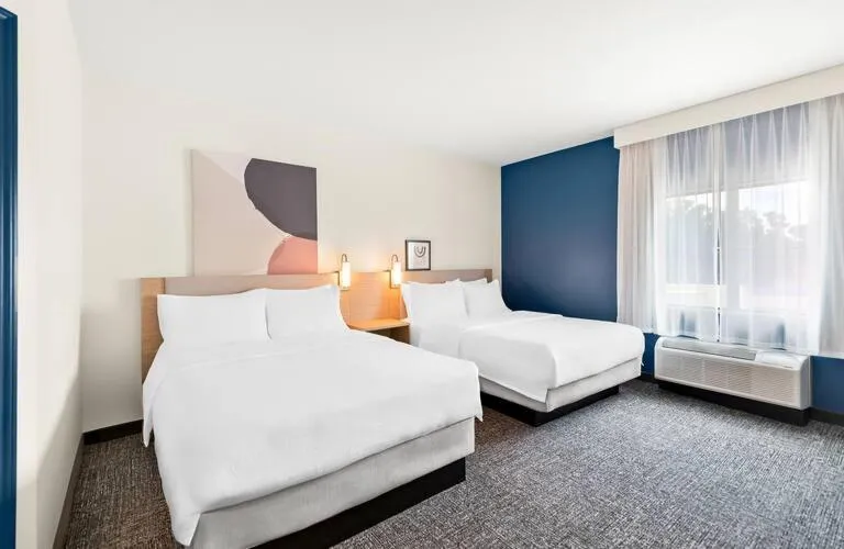 Bed in Super 8 by Wyndham Nacogdoches