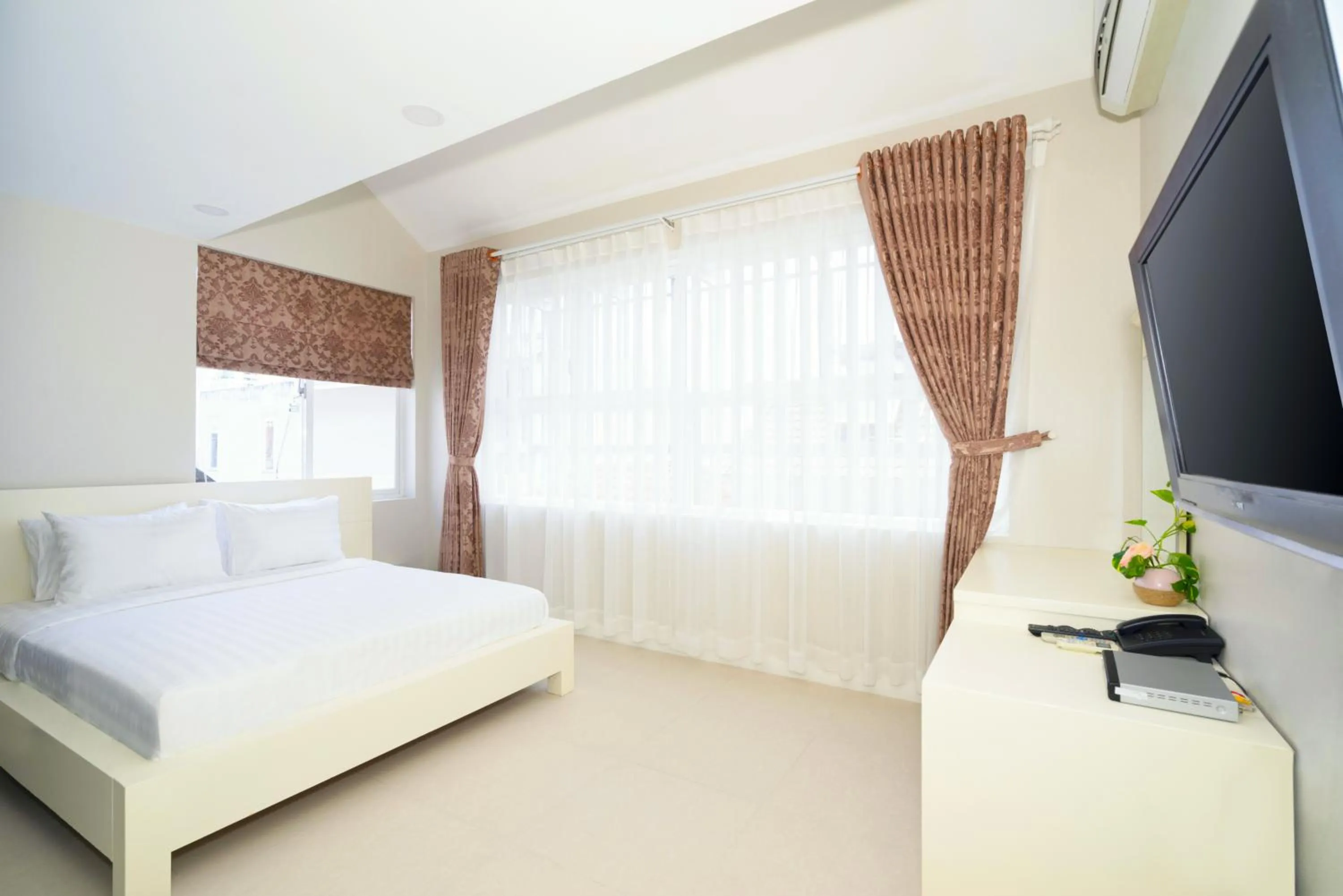 Bedroom in Sunshine Boutique Hotel Phu My Hung