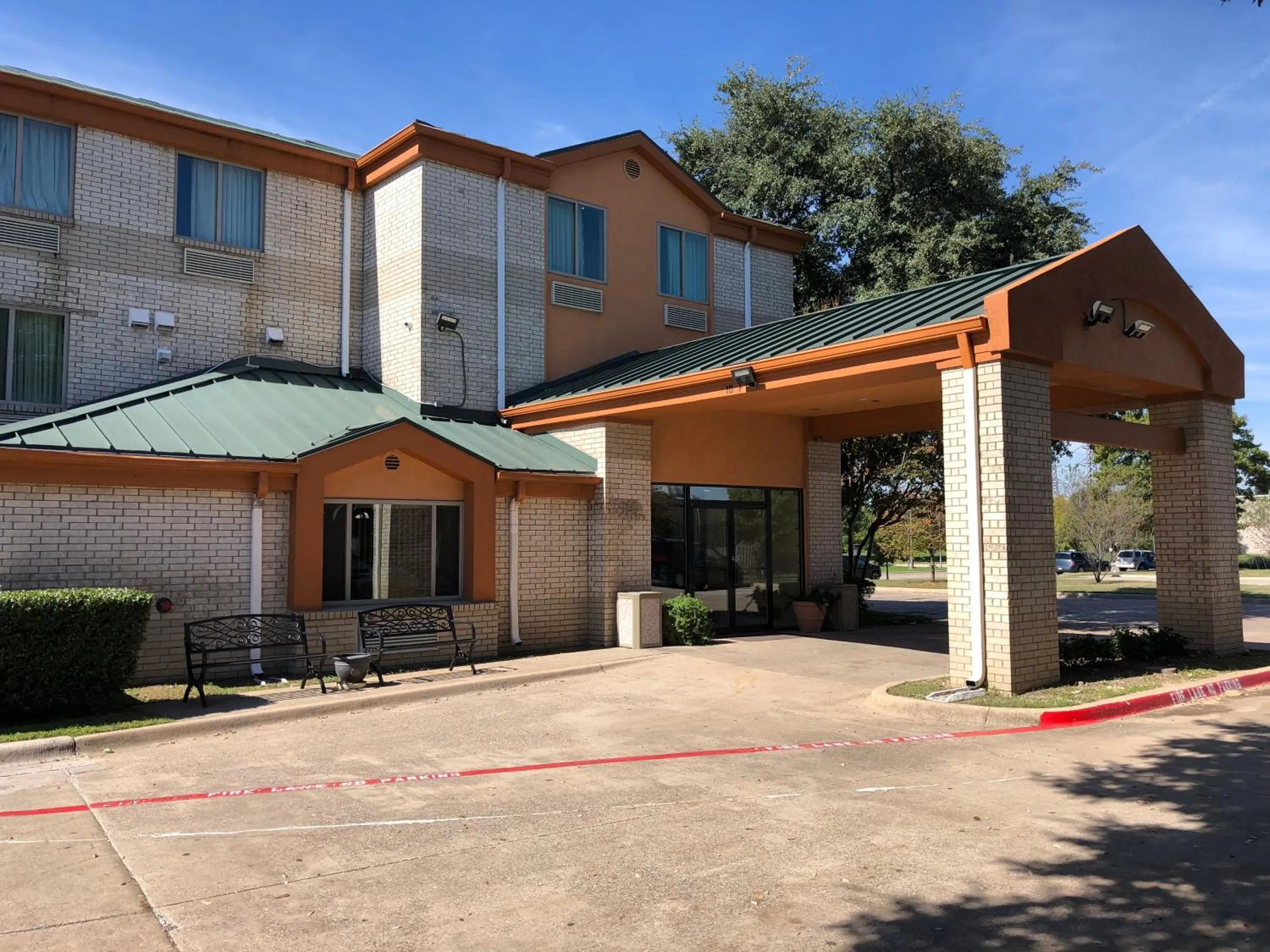 Property building in Americas Best Value Inn Addison