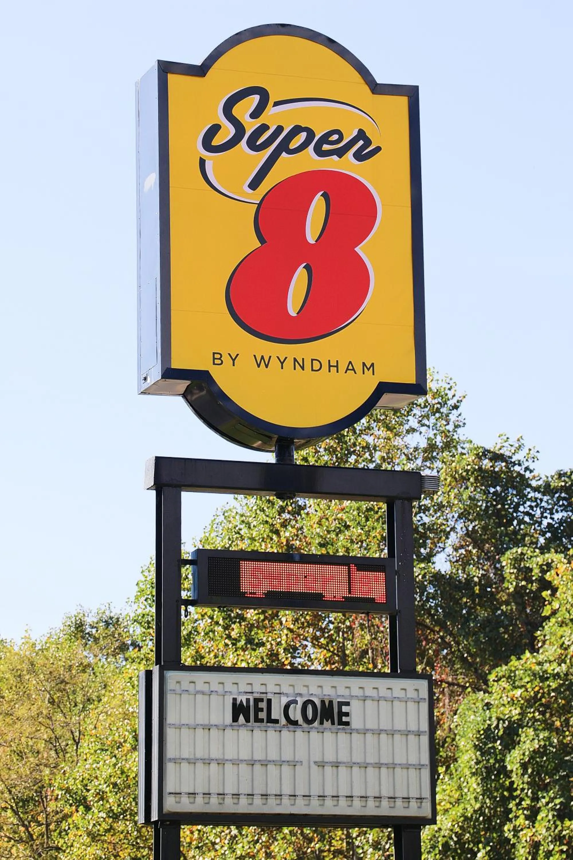 Property logo or sign in Super 8 by Wyndham Marion NC
