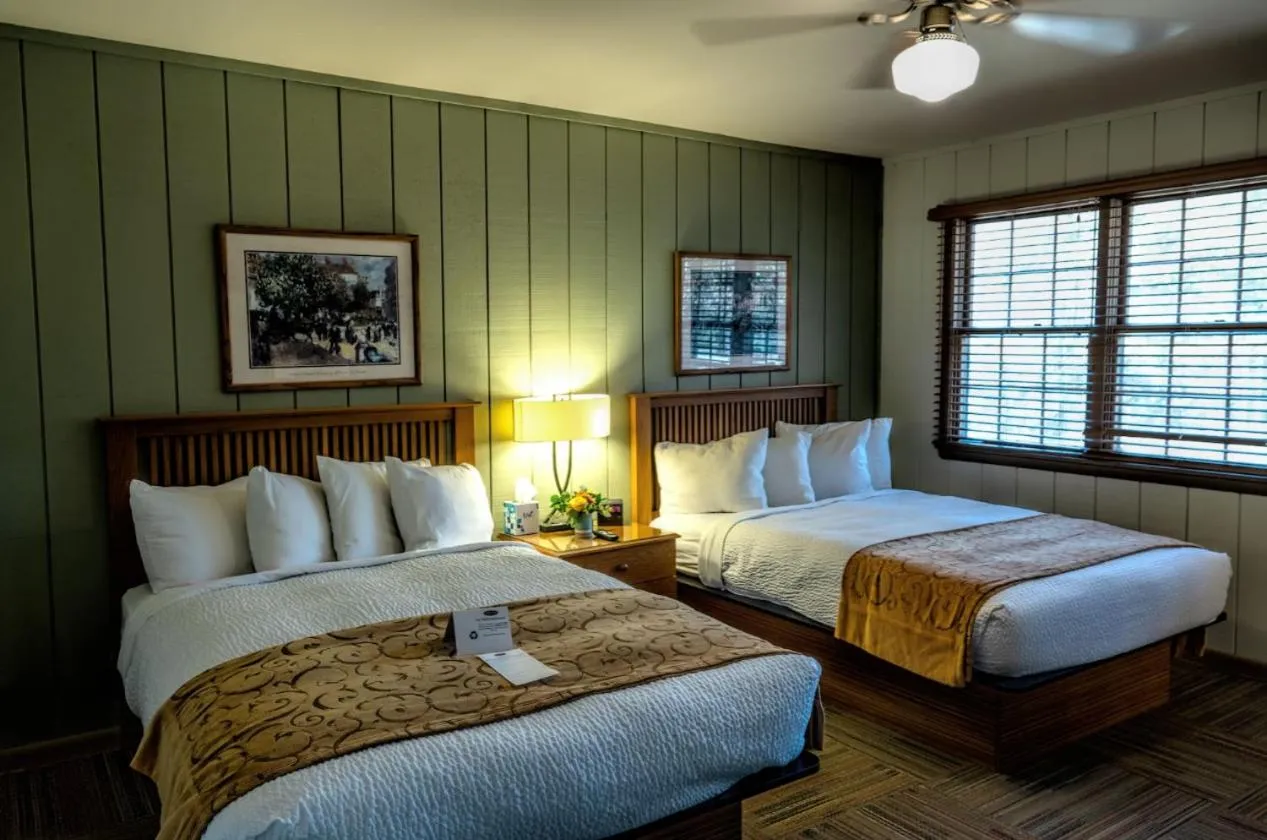 Bed in POSTOAK Lodge and Retreat