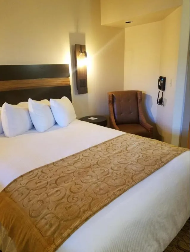 Bed in POSTOAK Lodge and Retreat