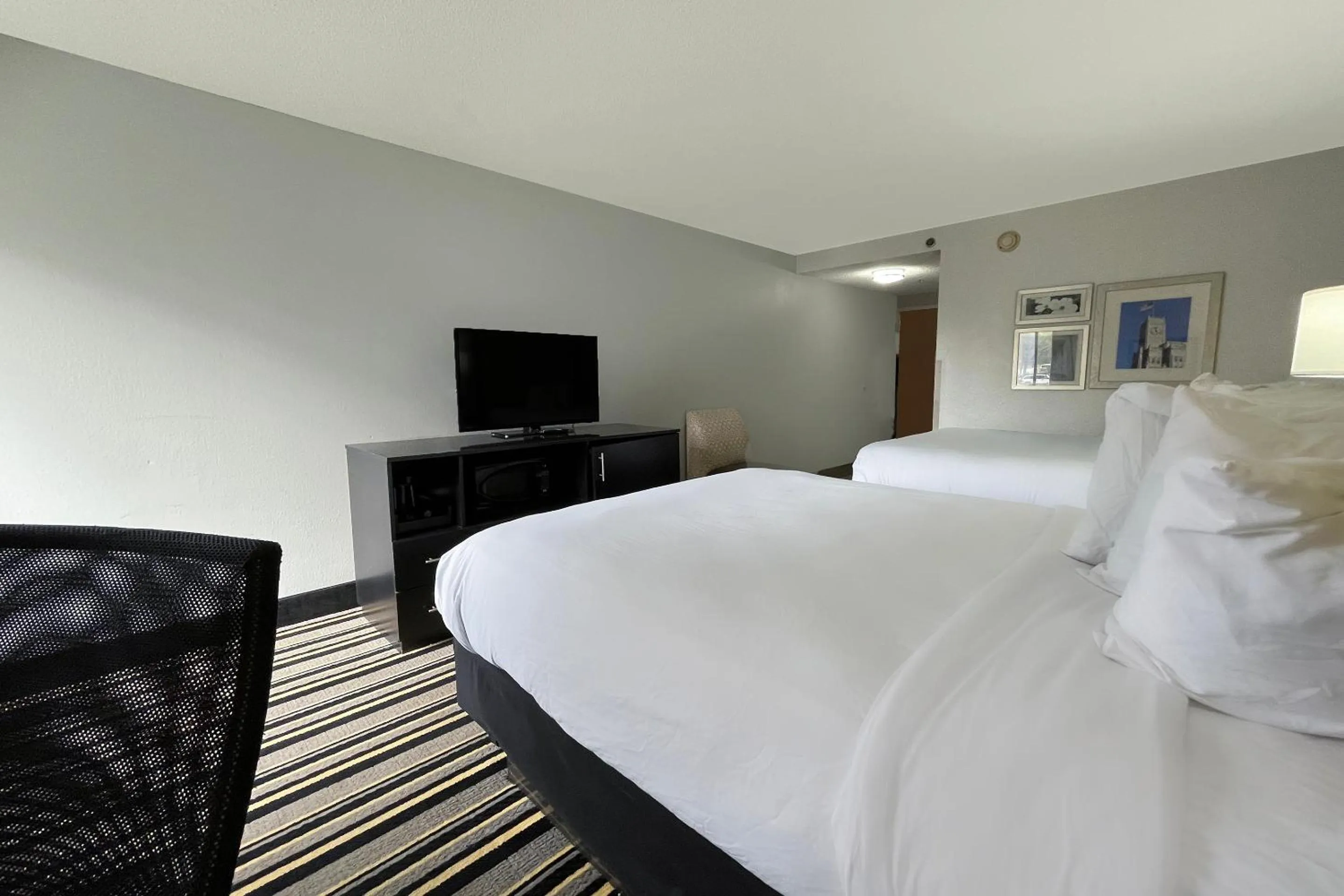 Bedroom, Bed in OYO Townhouse Jackson - Ridgeland