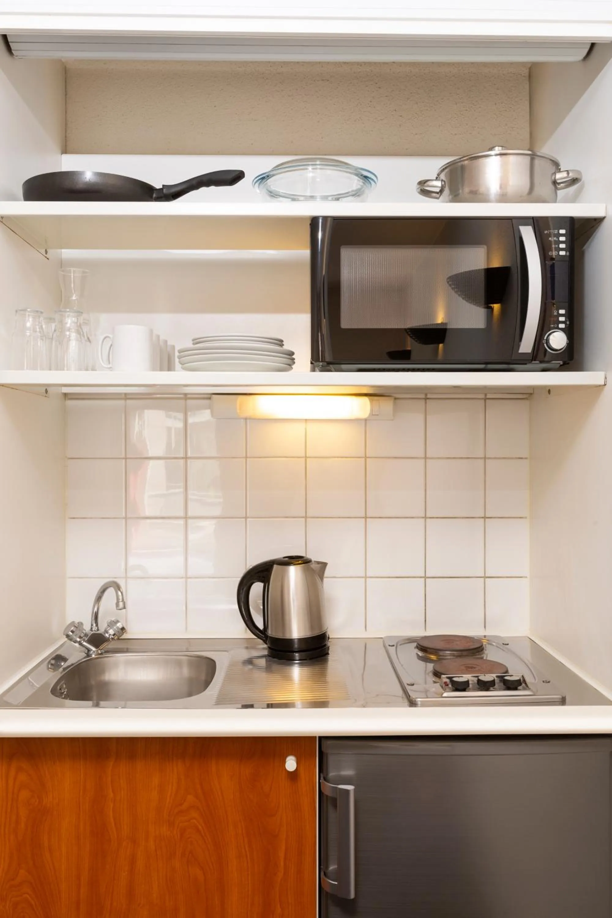 Kitchen or kitchenette in Aparthotel Adagio Access La Défense - Léonard De Vinci