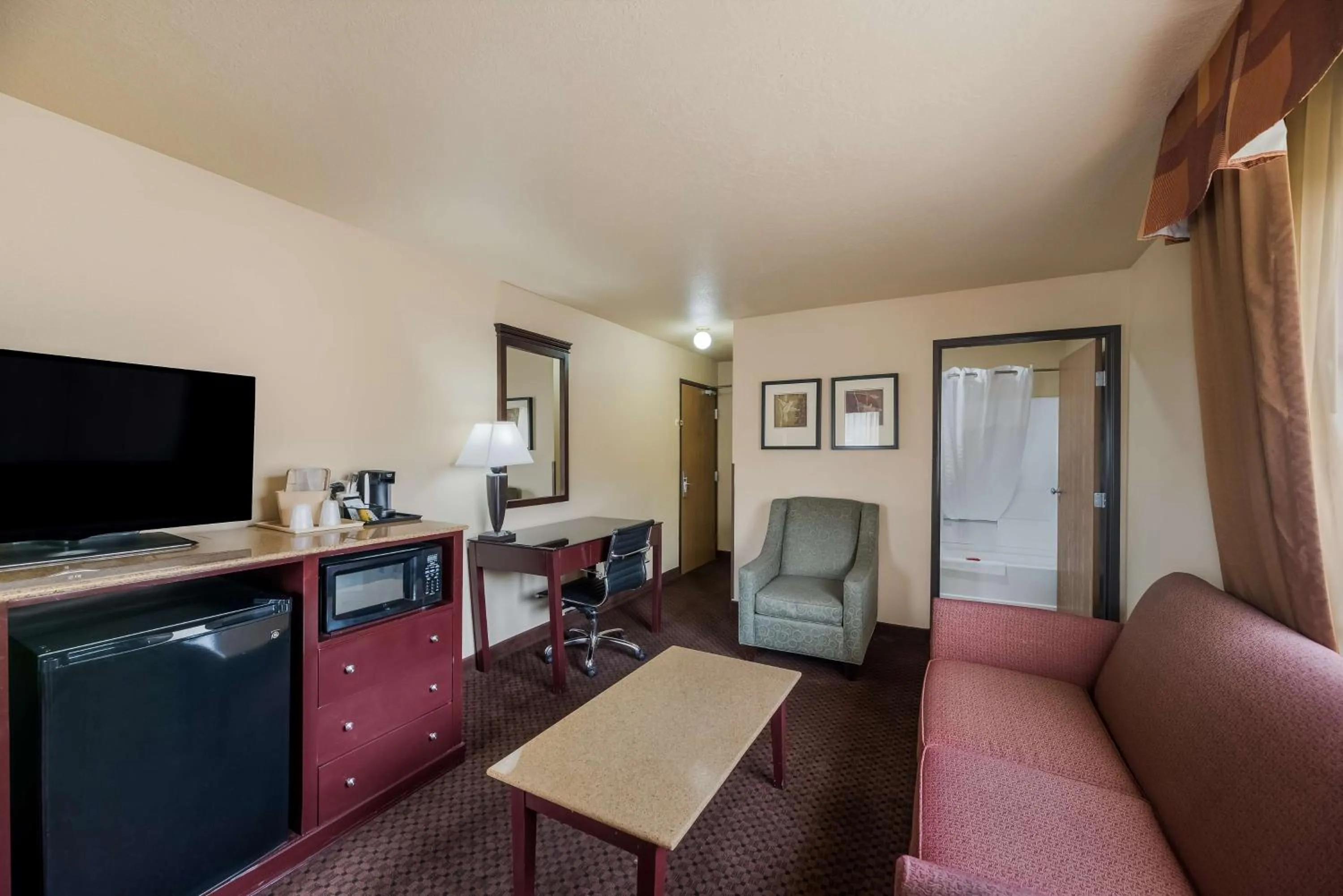 Photo of the whole room in SureStay Plus Hotel by Best Western Silver City